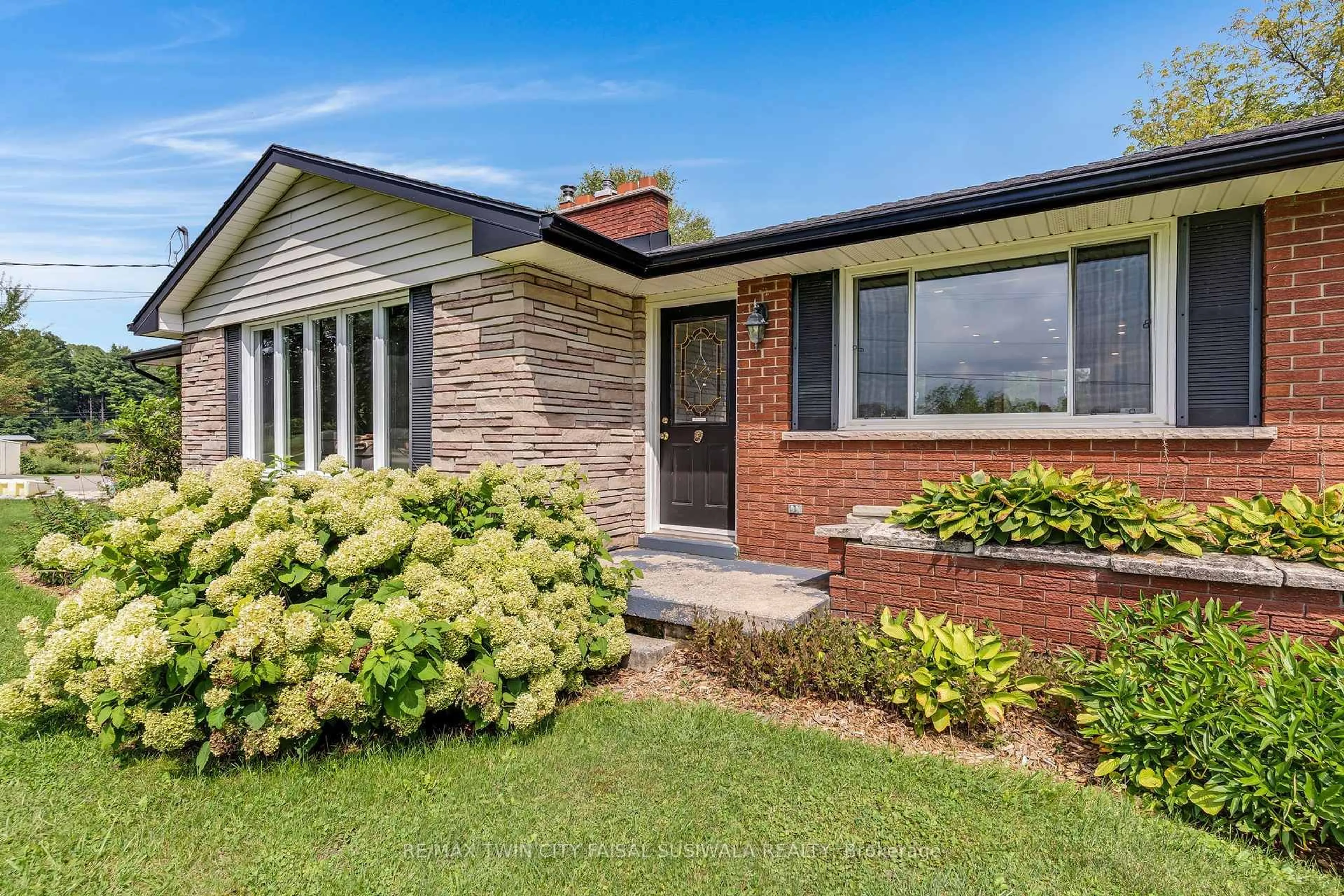 Home with brick exterior material, street for 2172 Centre Rd, Hamilton Ontario L0P 1B0