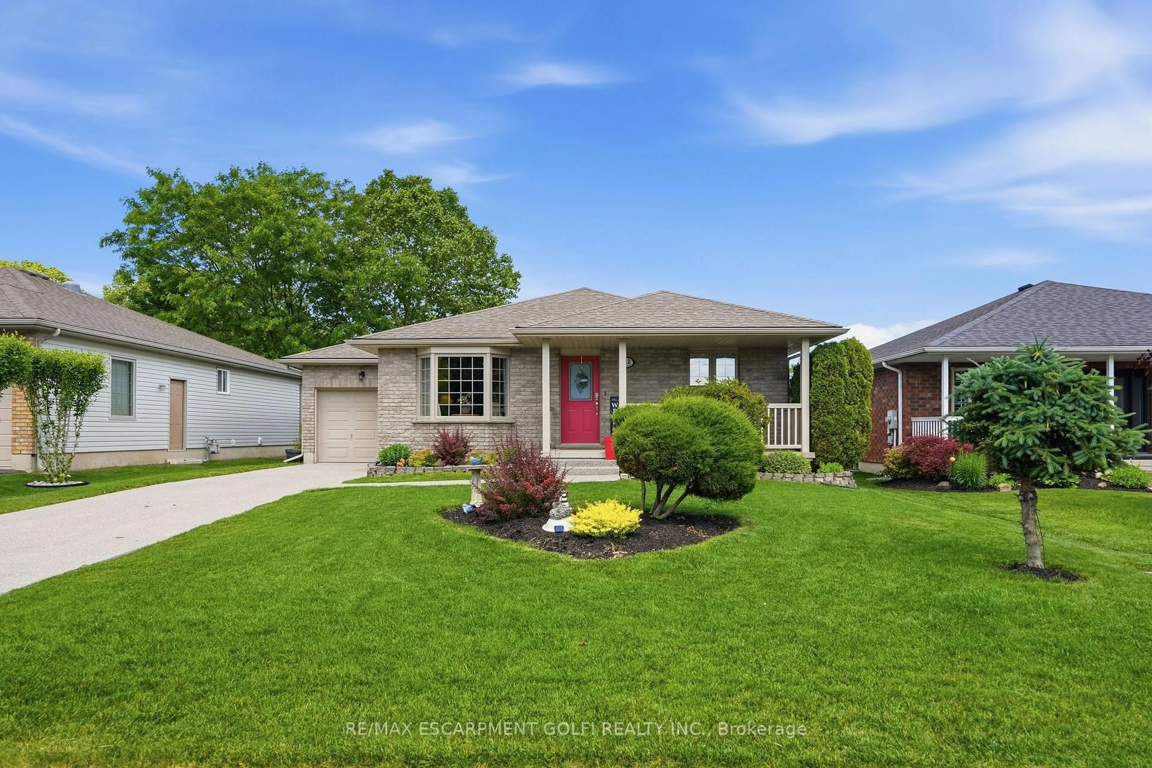 Home with vinyl exterior material, street for 12 Schneider Dr, Norfolk Ontario N0A 1N4