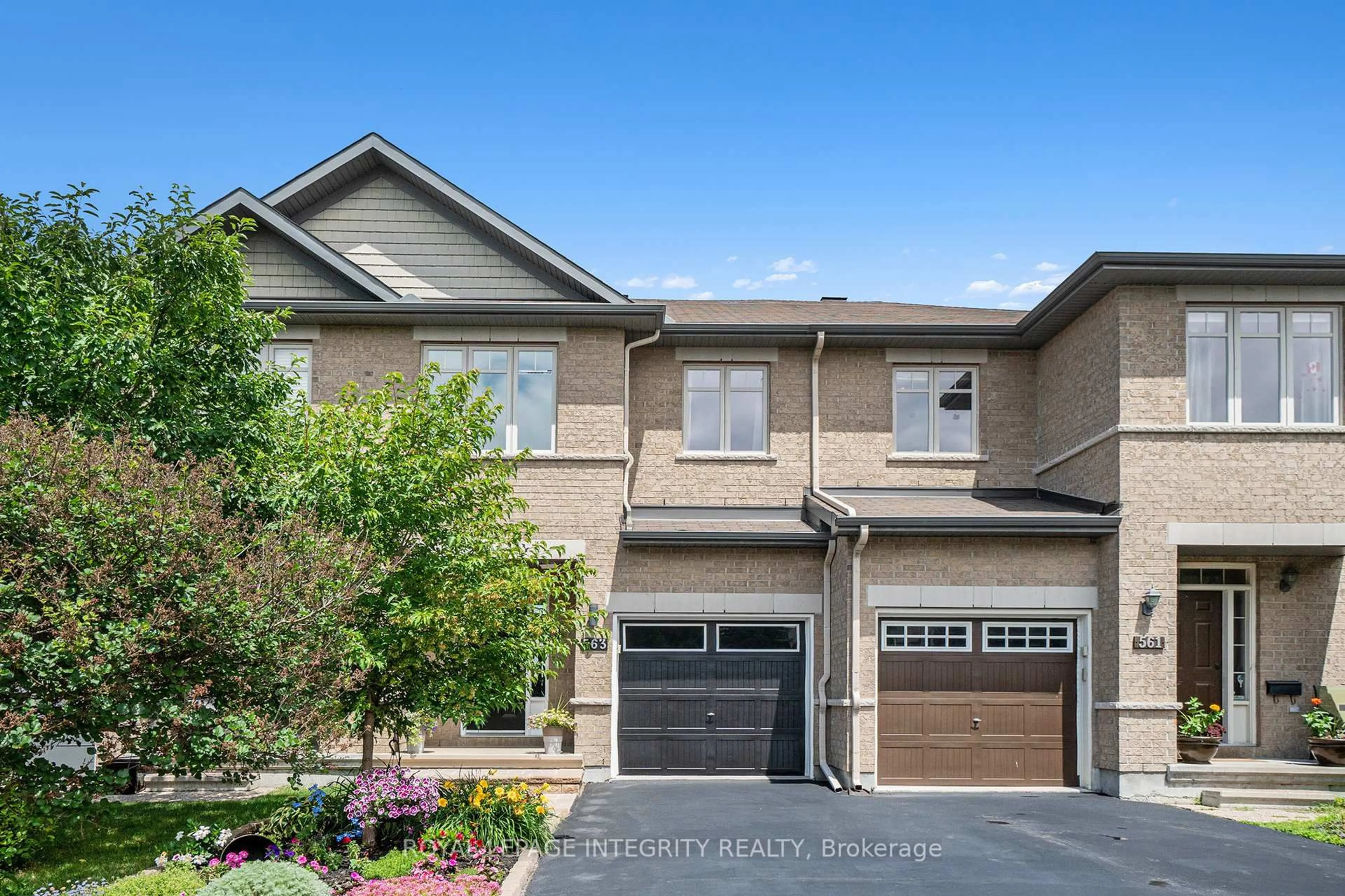 Home with brick exterior material, street for 563 Remnor Ave, Ottawa Ontario K2T 0A5