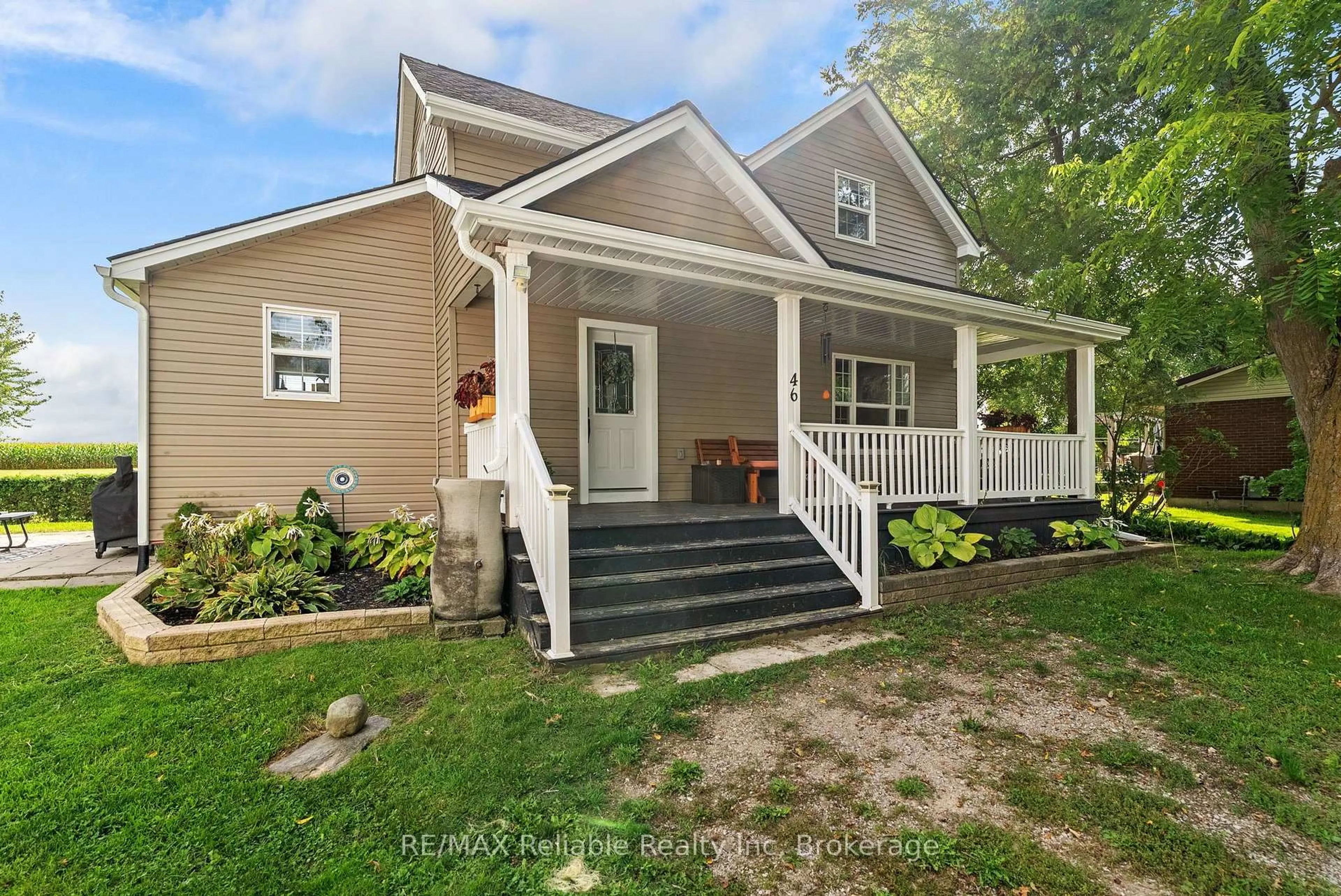 Home with vinyl exterior material, street for 46 Harpurhey Rd, Huron East Ontario N0K 1W0