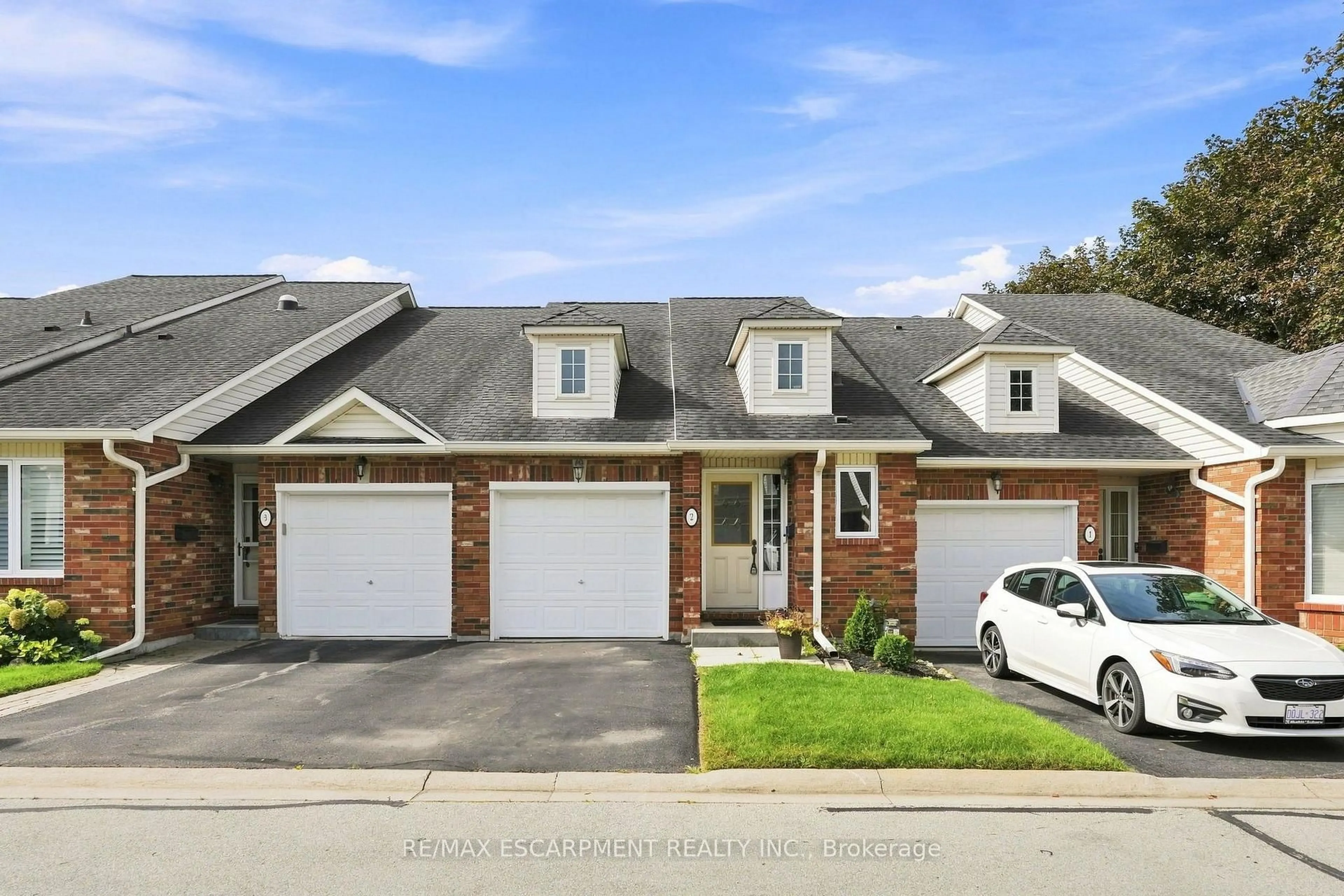 Home with brick exterior material, street for 222 FELLOWES Cres #2, Hamilton Ontario L8B 0R1