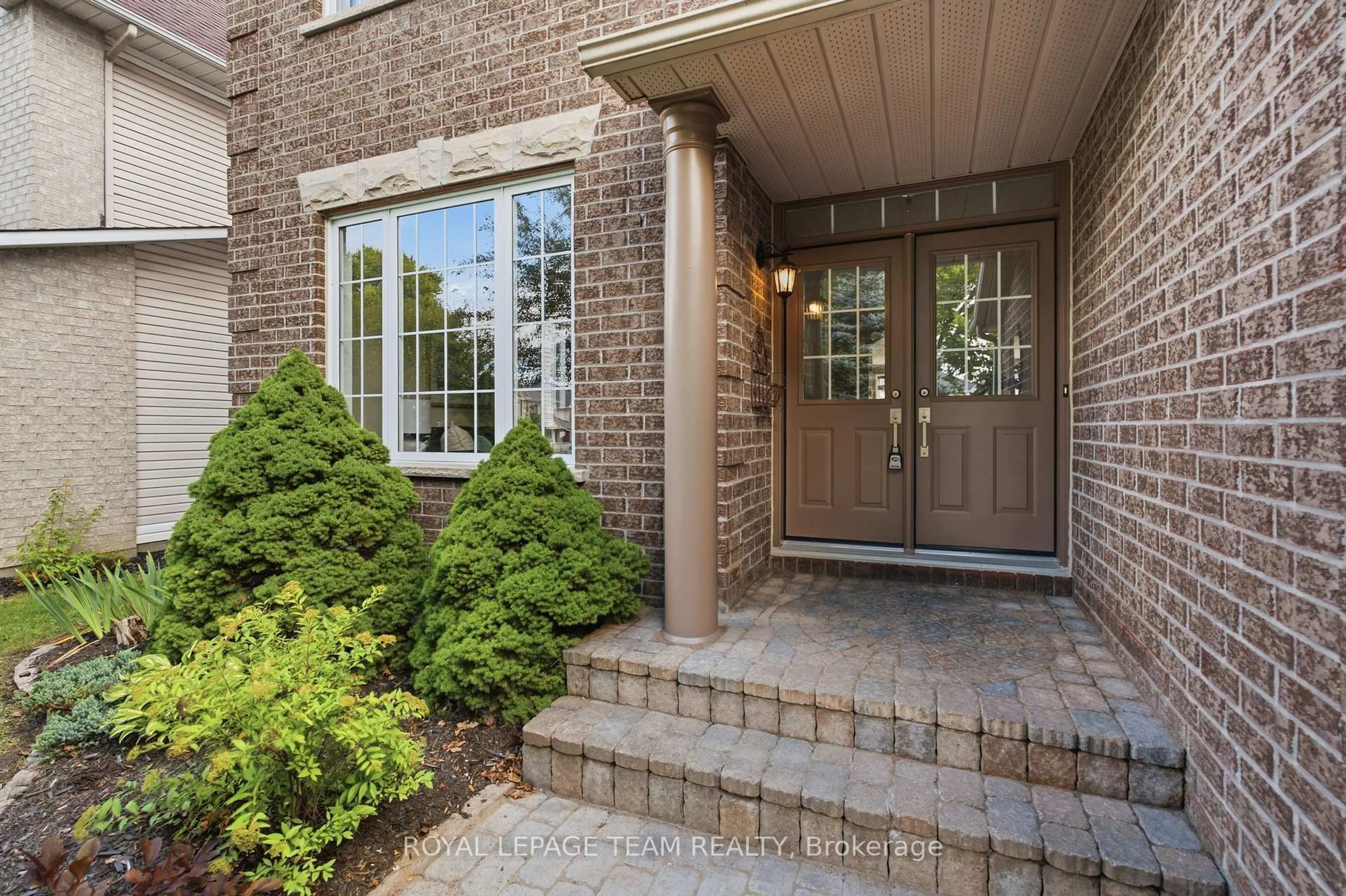 Home with brick exterior material, street for 32 Glenrill Pl, Ottawa Ontario K2M 2T5