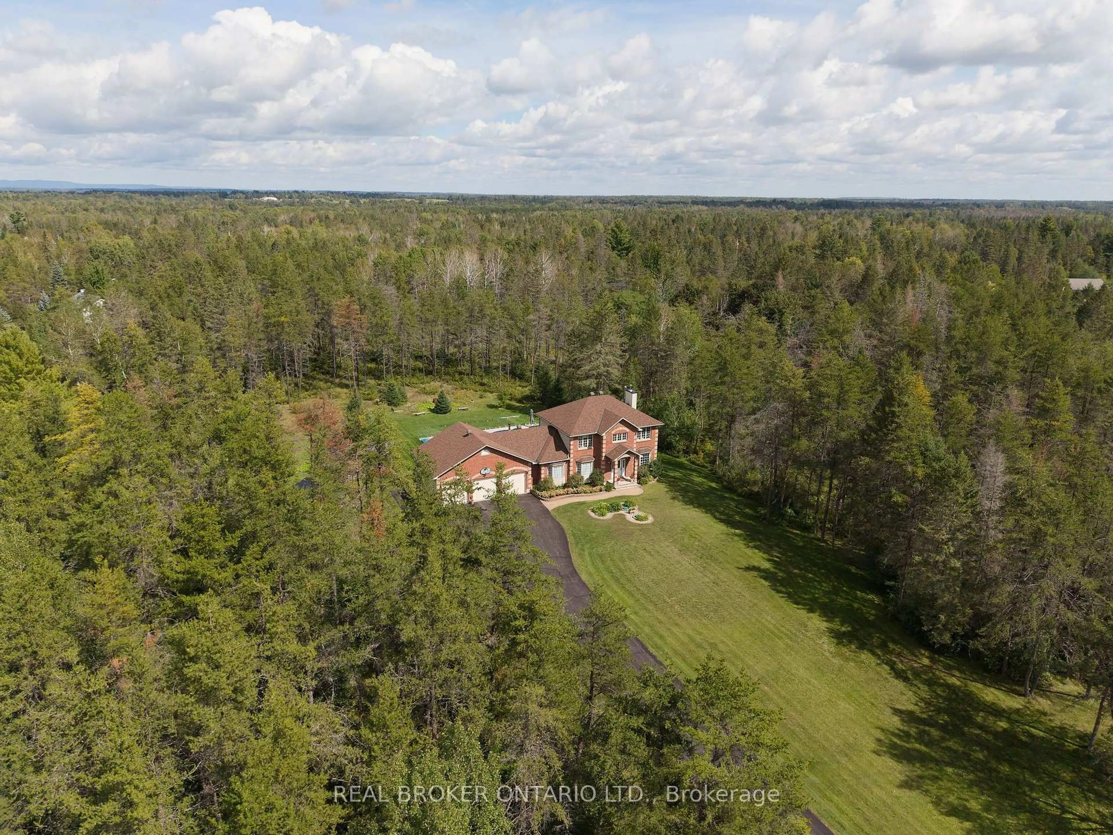 A pic from outside/outdoor area/front of a property/back of a property/a pic from drone, forest/trees view for 177 Grey Fox Dr, Carp Ontario K0A 1L0