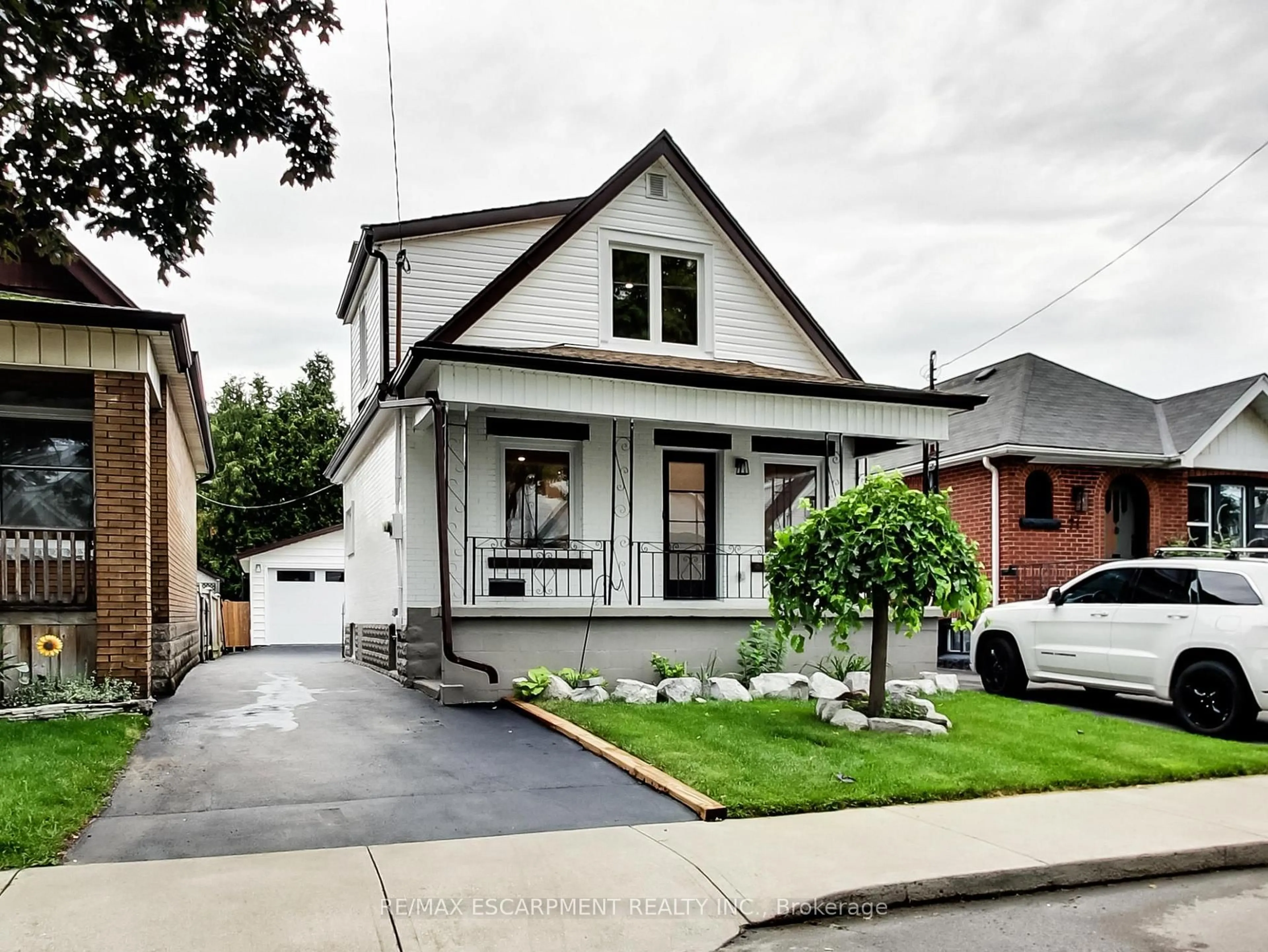 Home with brick exterior material, street for 67 Cope St, Hamilton Ontario L8H 5B1