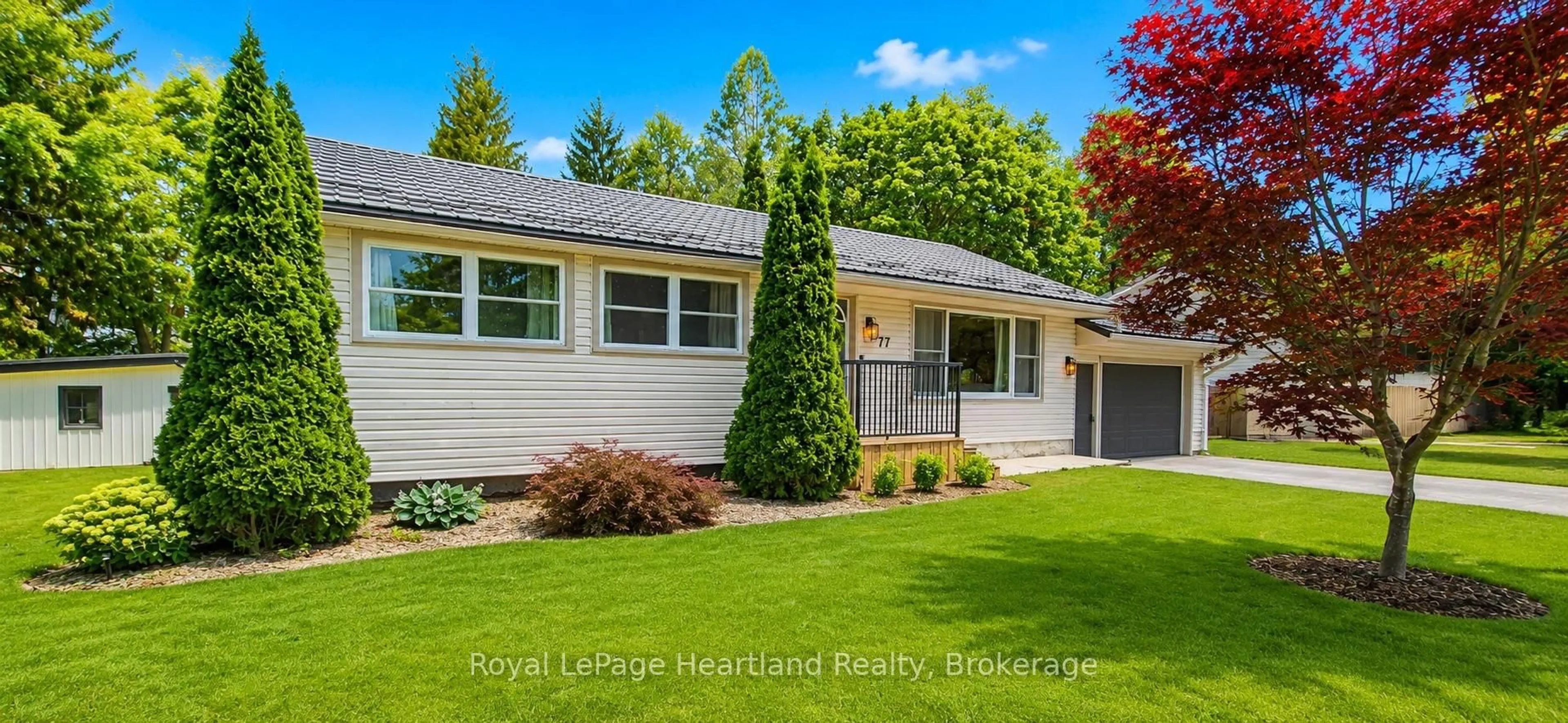 Home with vinyl exterior material, street for 77 Chalk St, Huron East Ontario N0K 1W0