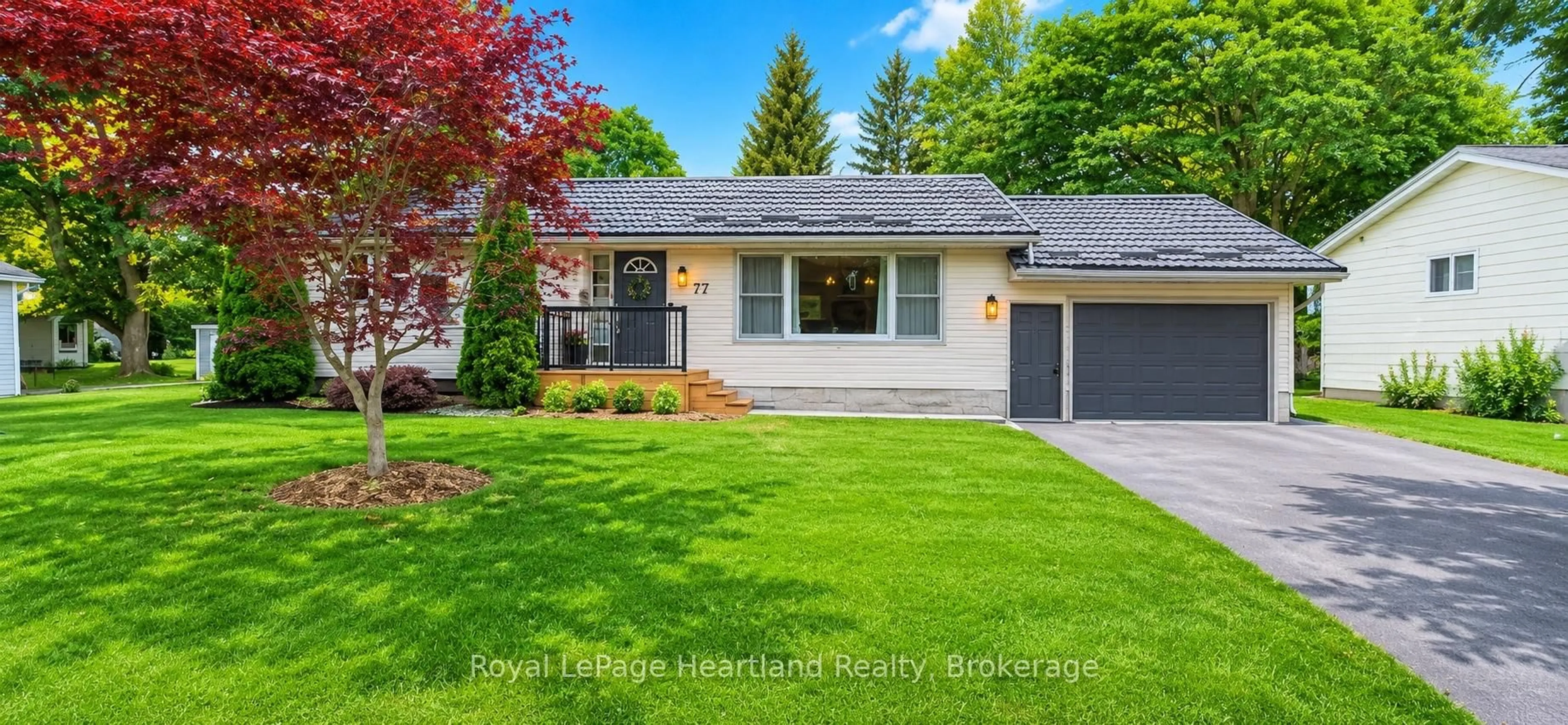 Home with vinyl exterior material, street for 77 Chalk St, Huron East Ontario N0K 1W0