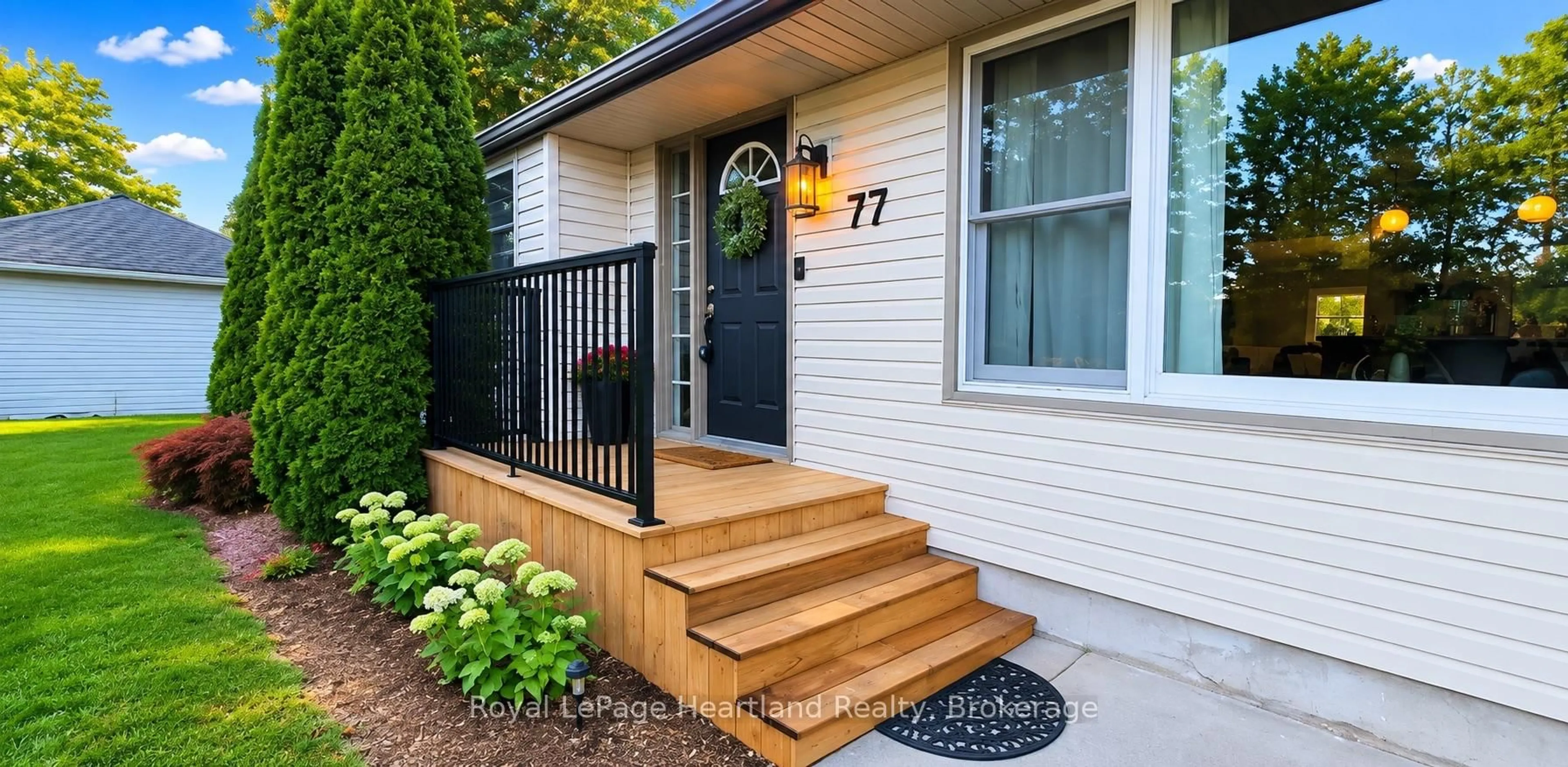 Home with vinyl exterior material, street for 77 Chalk St, Huron East Ontario N0K 1W0