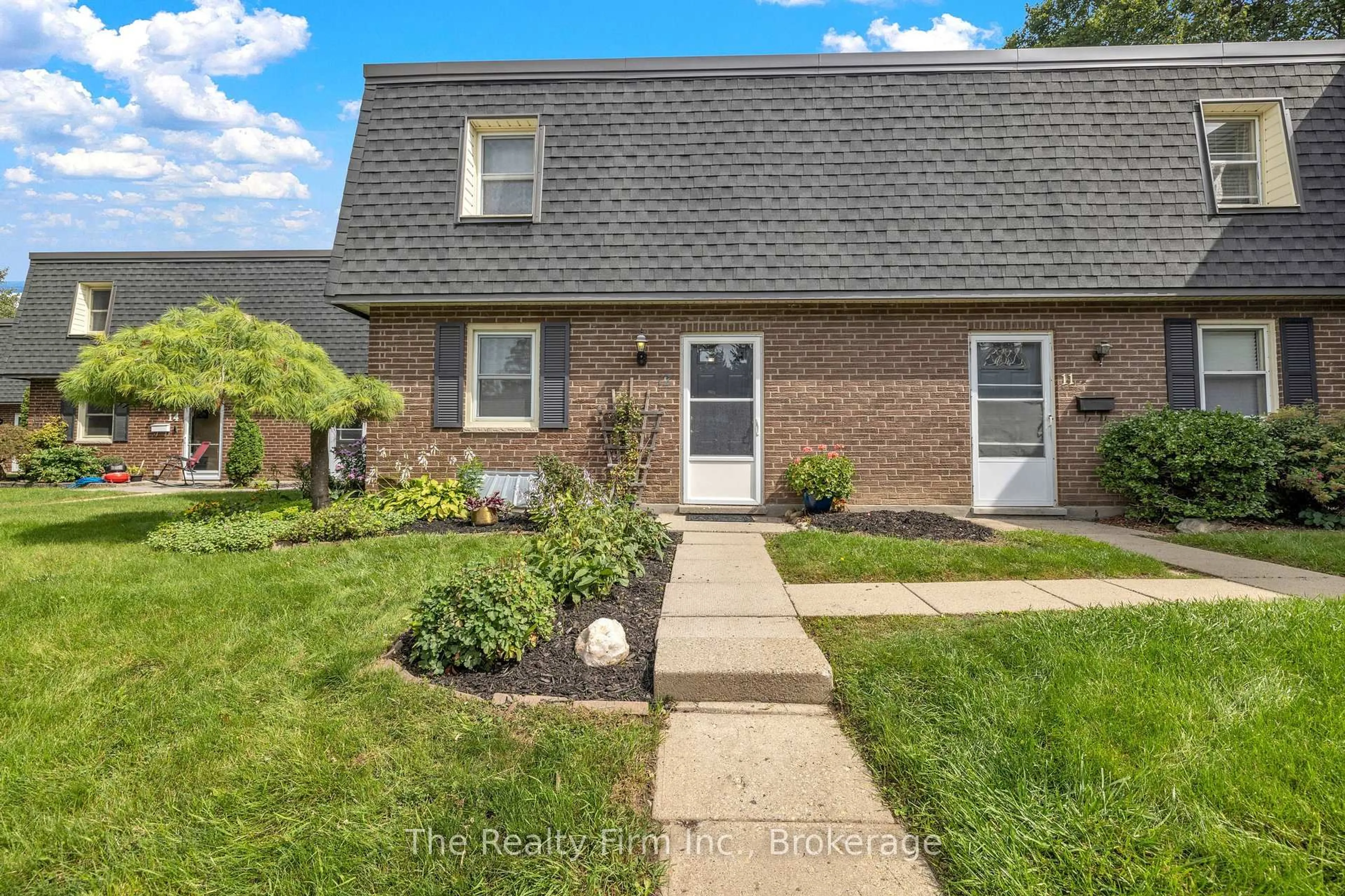 Home with brick exterior material, street for 598 Durham Cres #12, Woodstock Ontario N4S 5X3