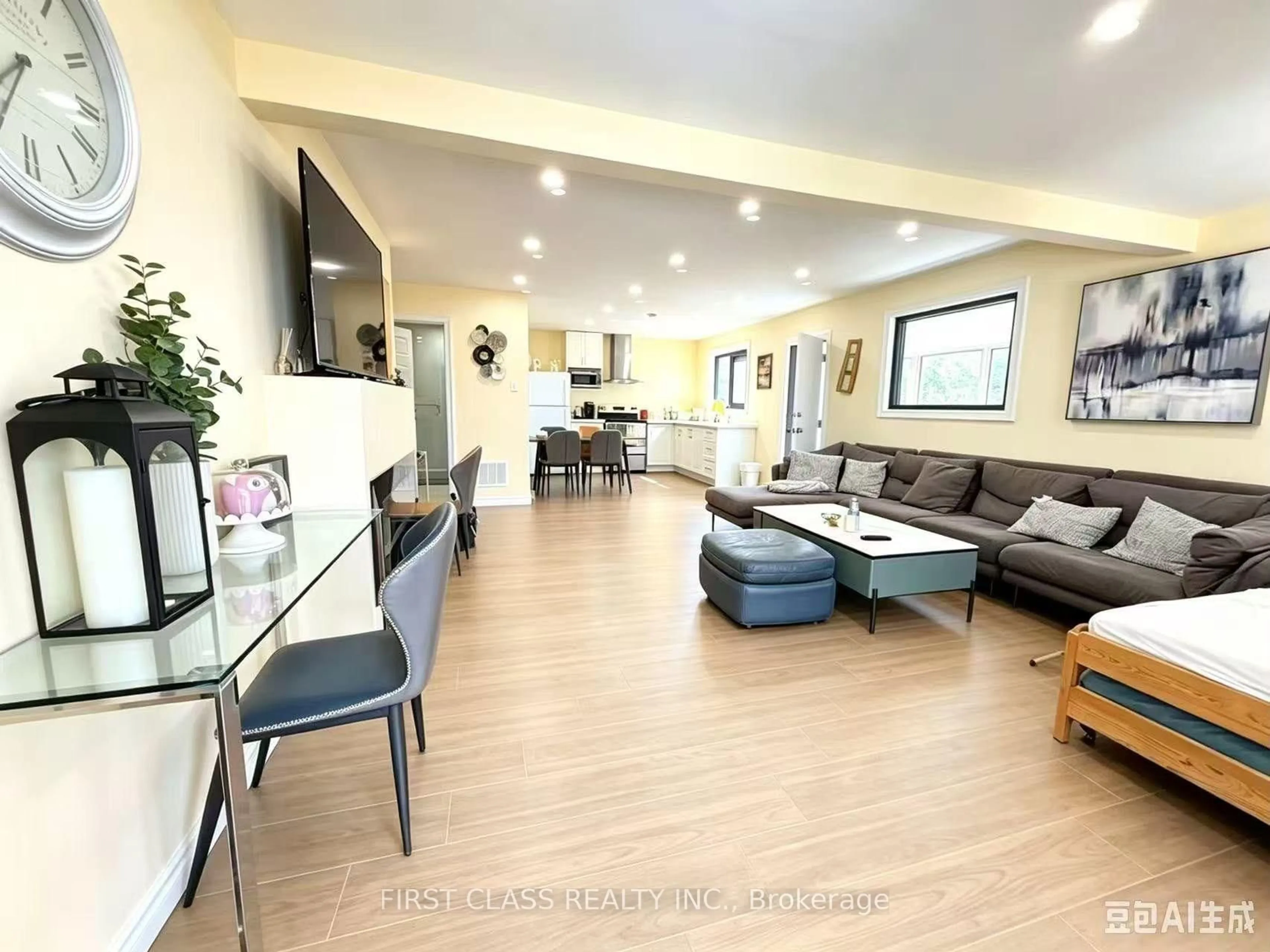 Living room with furniture, wood/laminate floor for 37 Laird Dr, Kawartha Lakes Ontario K9V 4R6