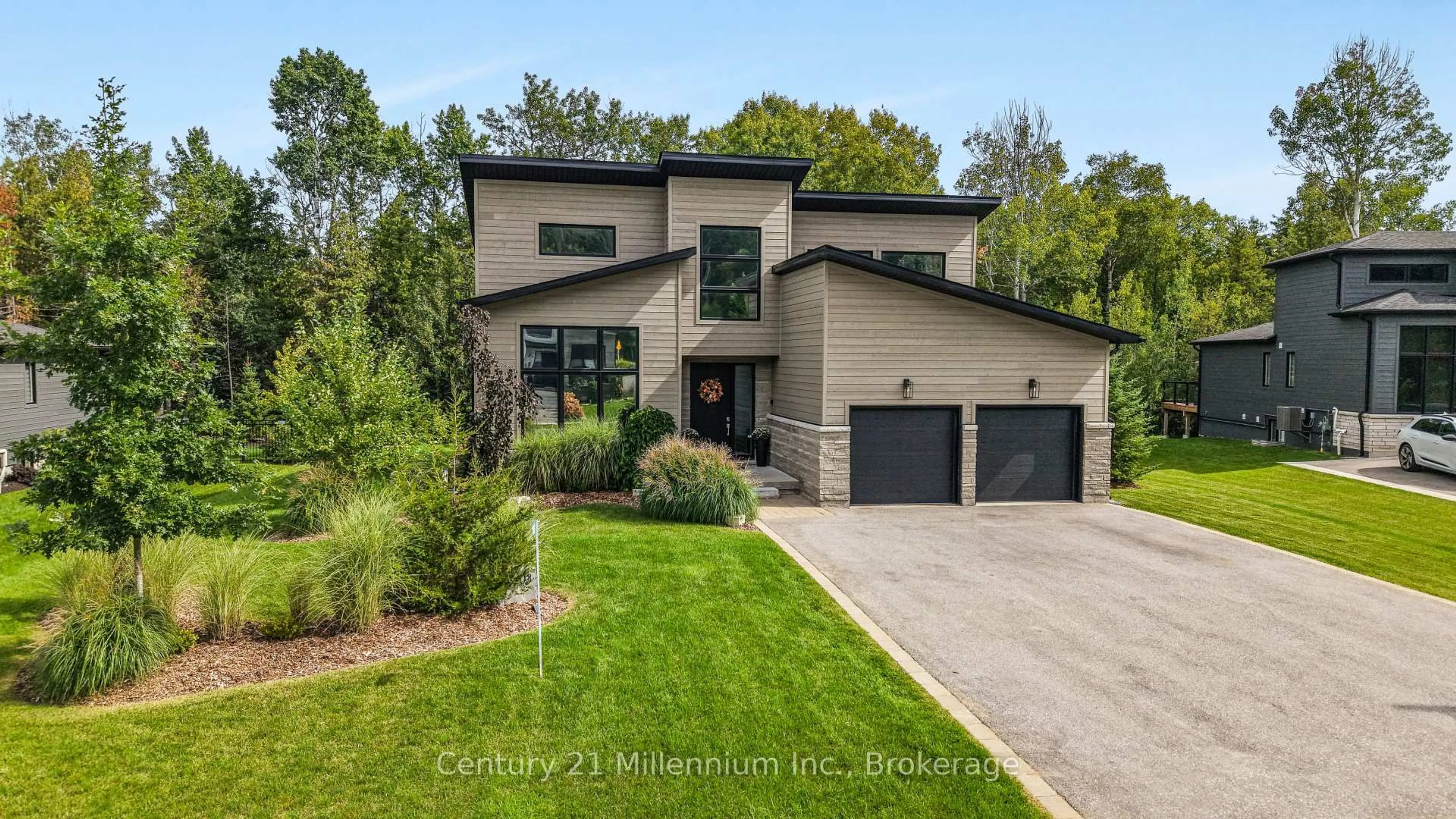 Home with brick exterior material, street for 103 Tekiah Rd, Blue Mountains Ontario N0H 1J0