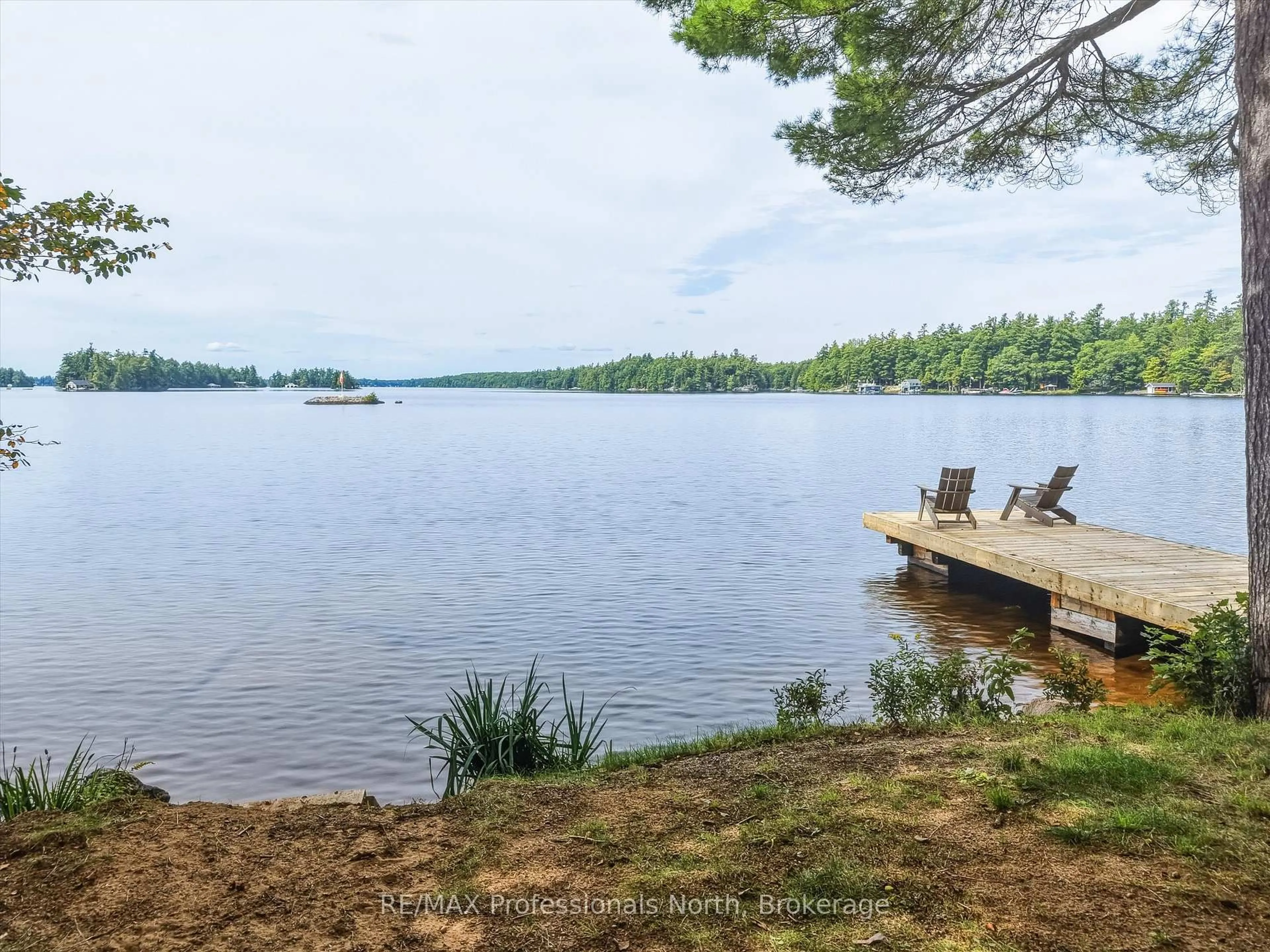 A pic from outside/outdoor area/front of a property/back of a property/a pic from drone, water/lake/river/ocean view for 1025 Section House Rd, Muskoka Lakes Ontario P0C 1M0