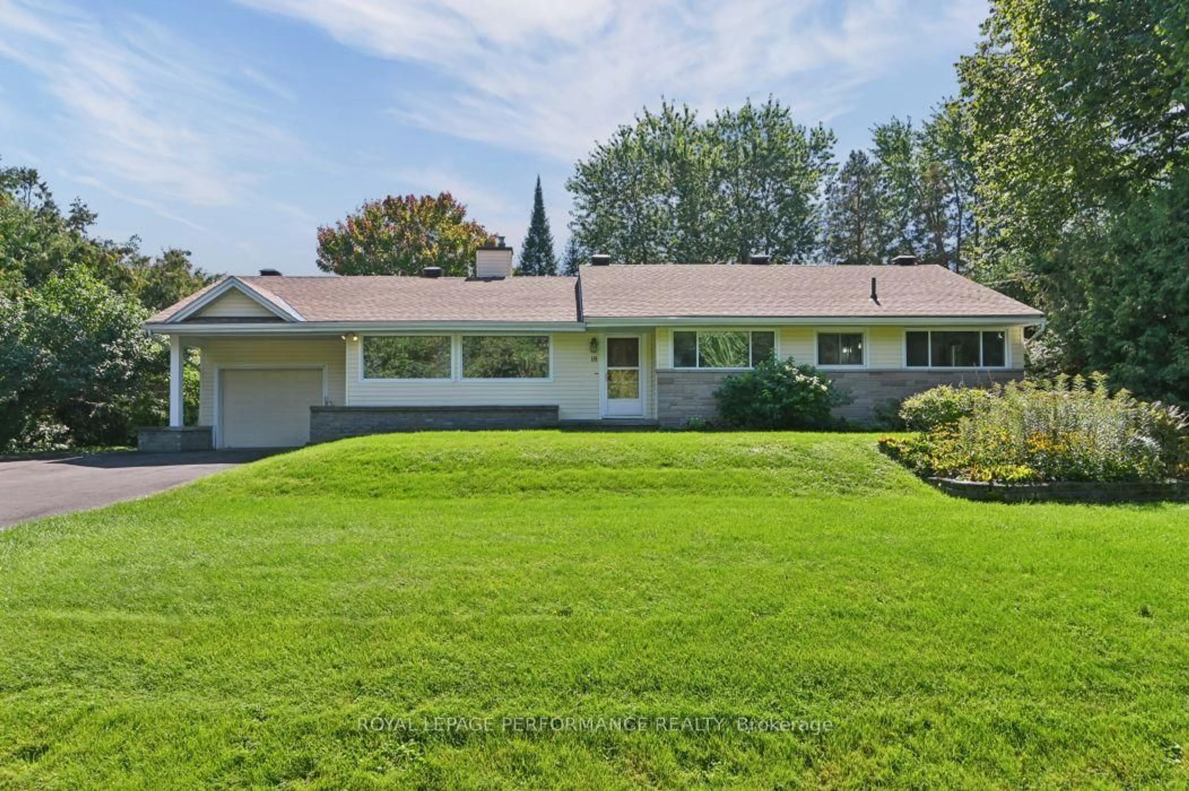 Home with vinyl exterior material, street for 18 Honey Gables Dr, Ottawa Ontario K1V 1H5