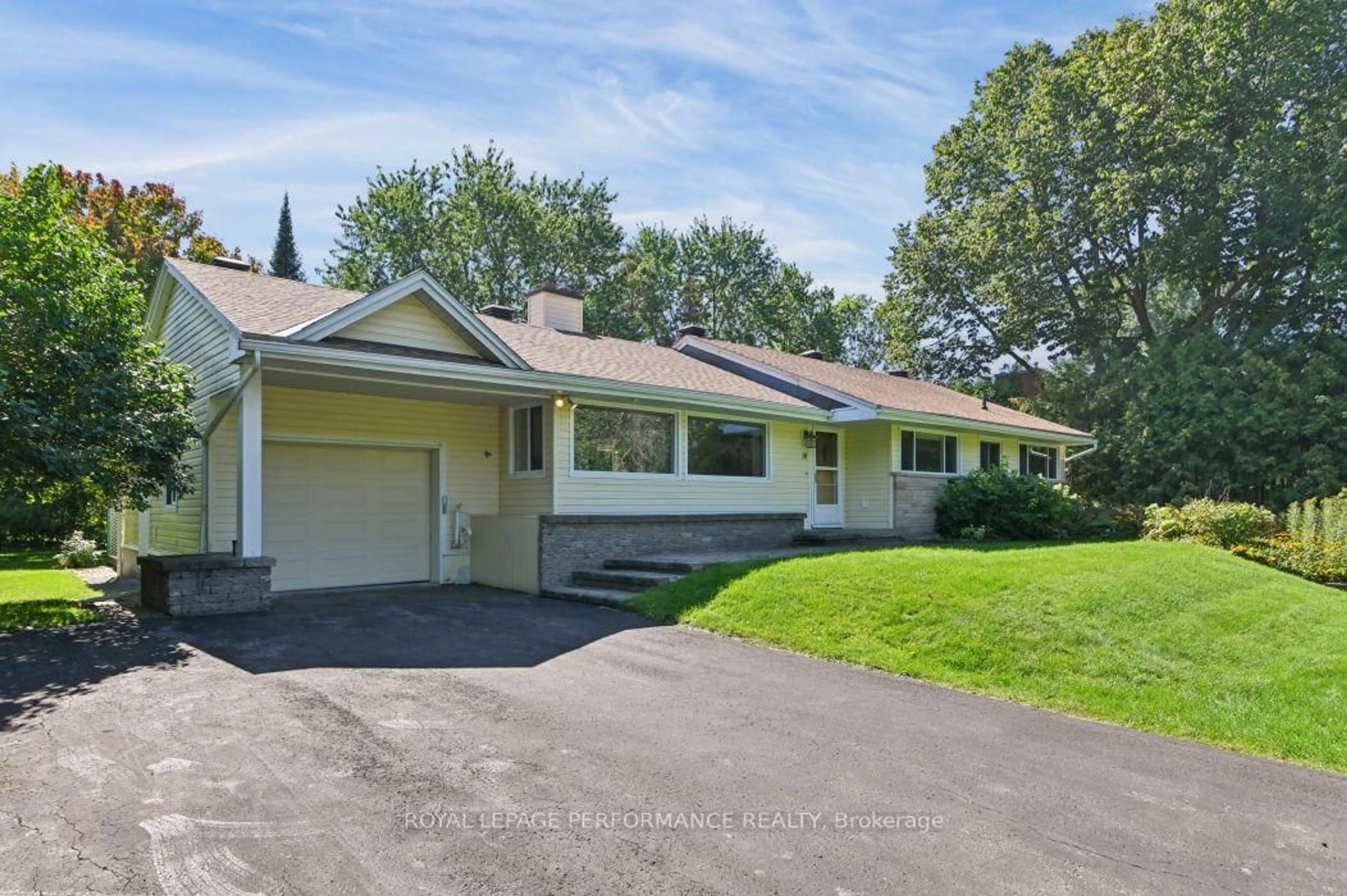 Home with vinyl exterior material, street for 18 Honey Gables Dr, Ottawa Ontario K1V 1H5