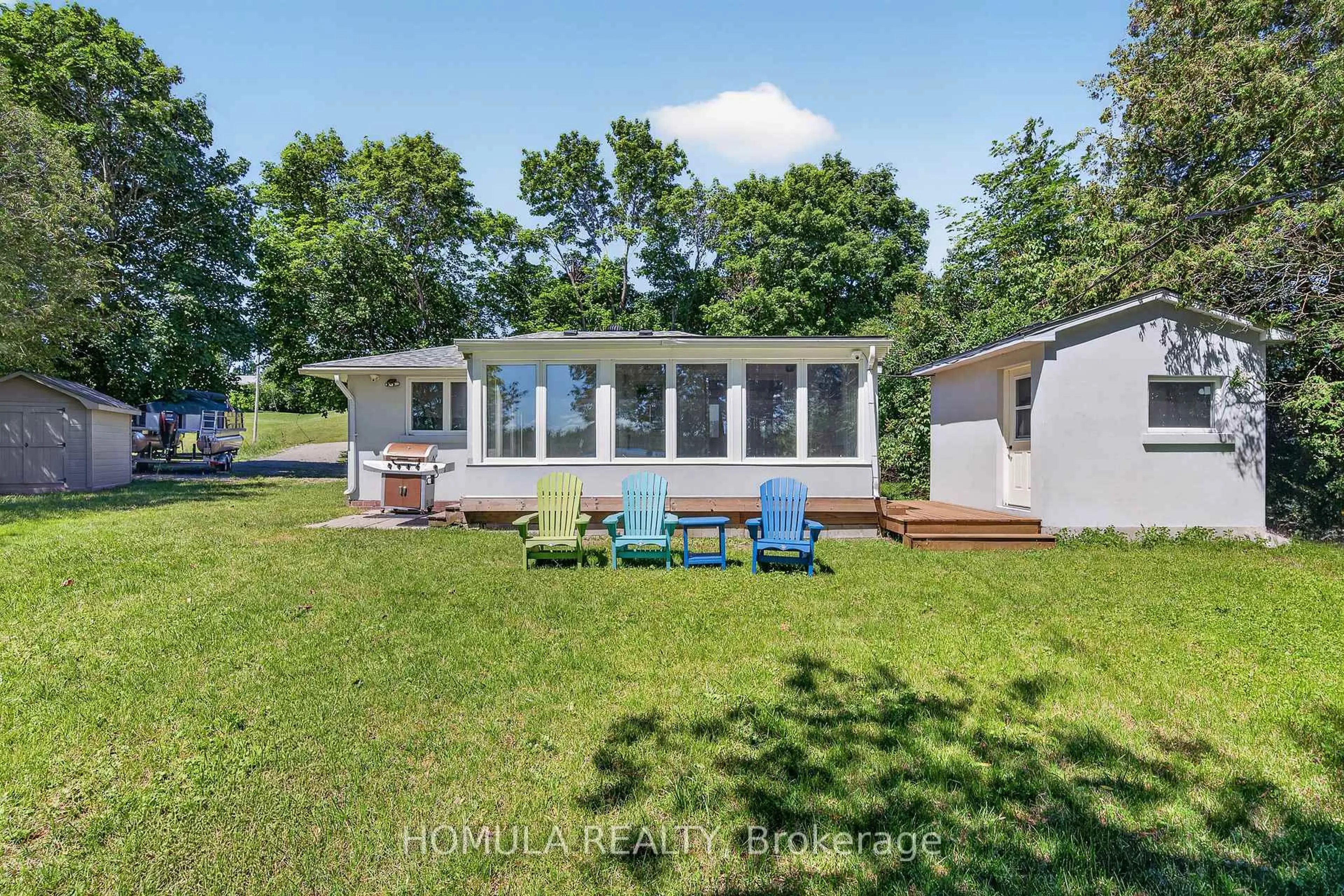 A pic from outside/outdoor area/front of a property/back of a property/a pic from drone, water/lake/river/ocean view for 24 Riverside Dr, Kawartha Lakes Ontario K9V 0H6
