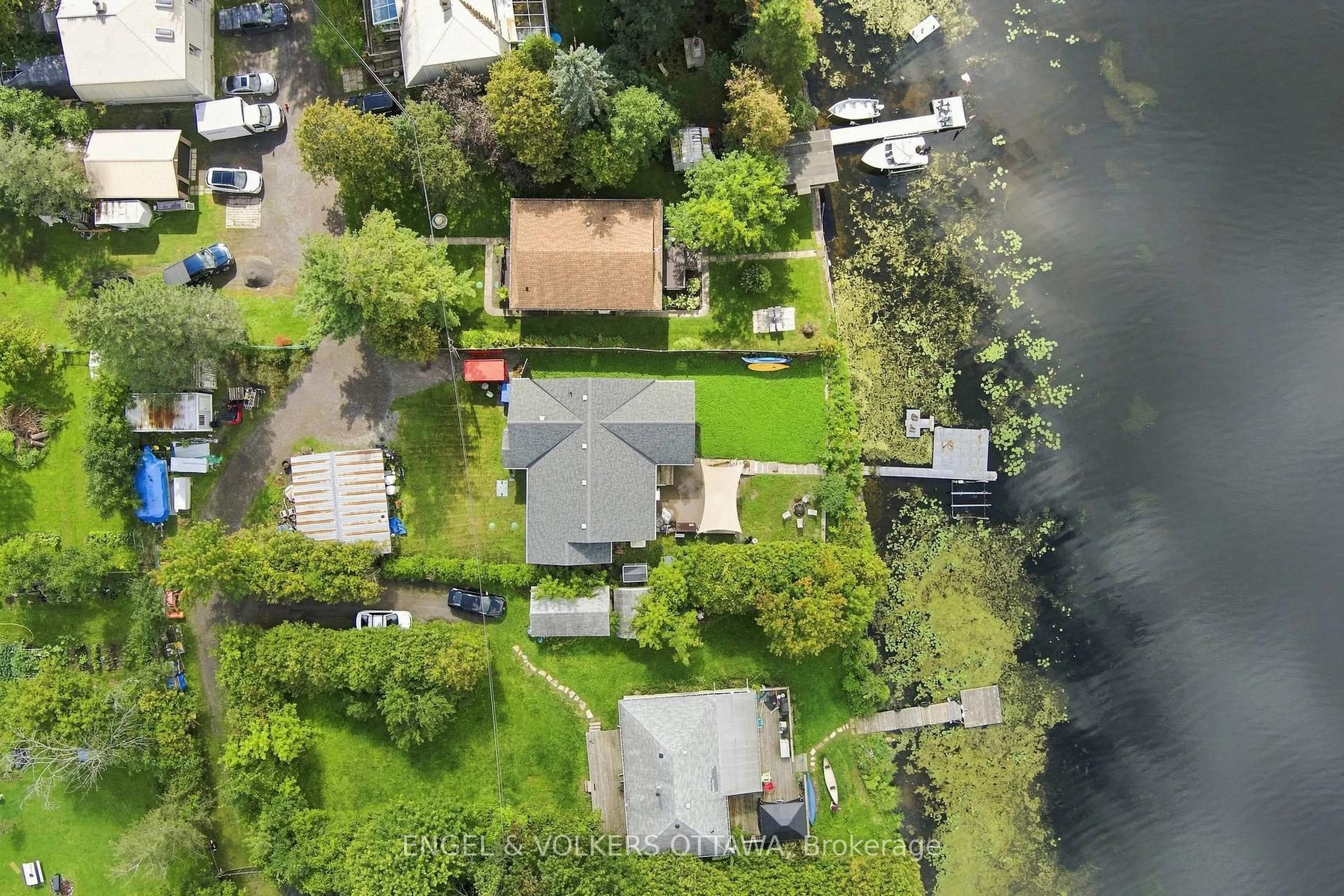 A pic from outside/outdoor area/front of a property/back of a property/a pic from drone, water/lake/river/ocean view for 1760B River Rd, Ottawa Ontario K4M 1B4