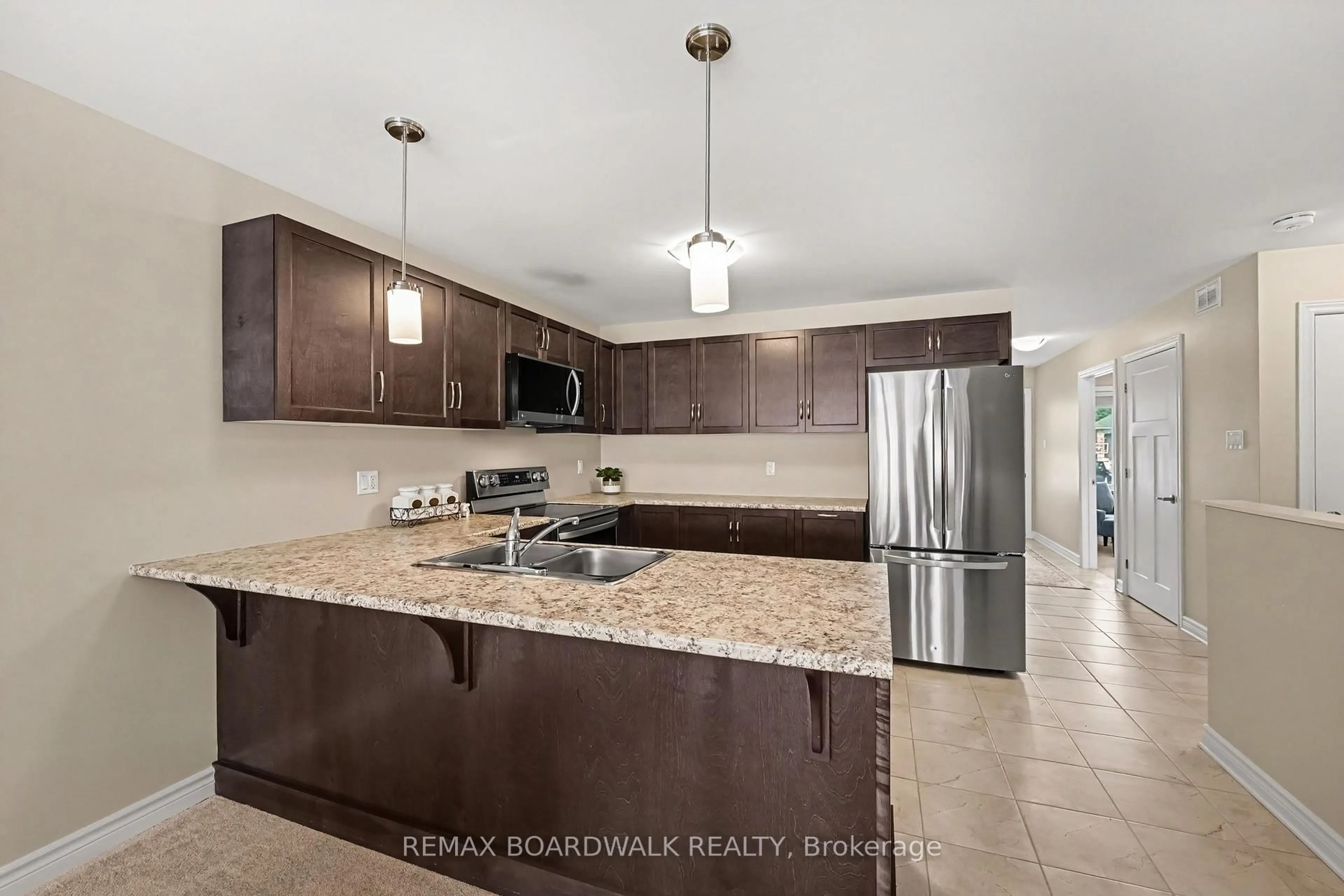 Open concept kitchen, ceramic/tile floor for 100 Seabert Dr, Arnprior Ontario K7S 0K1