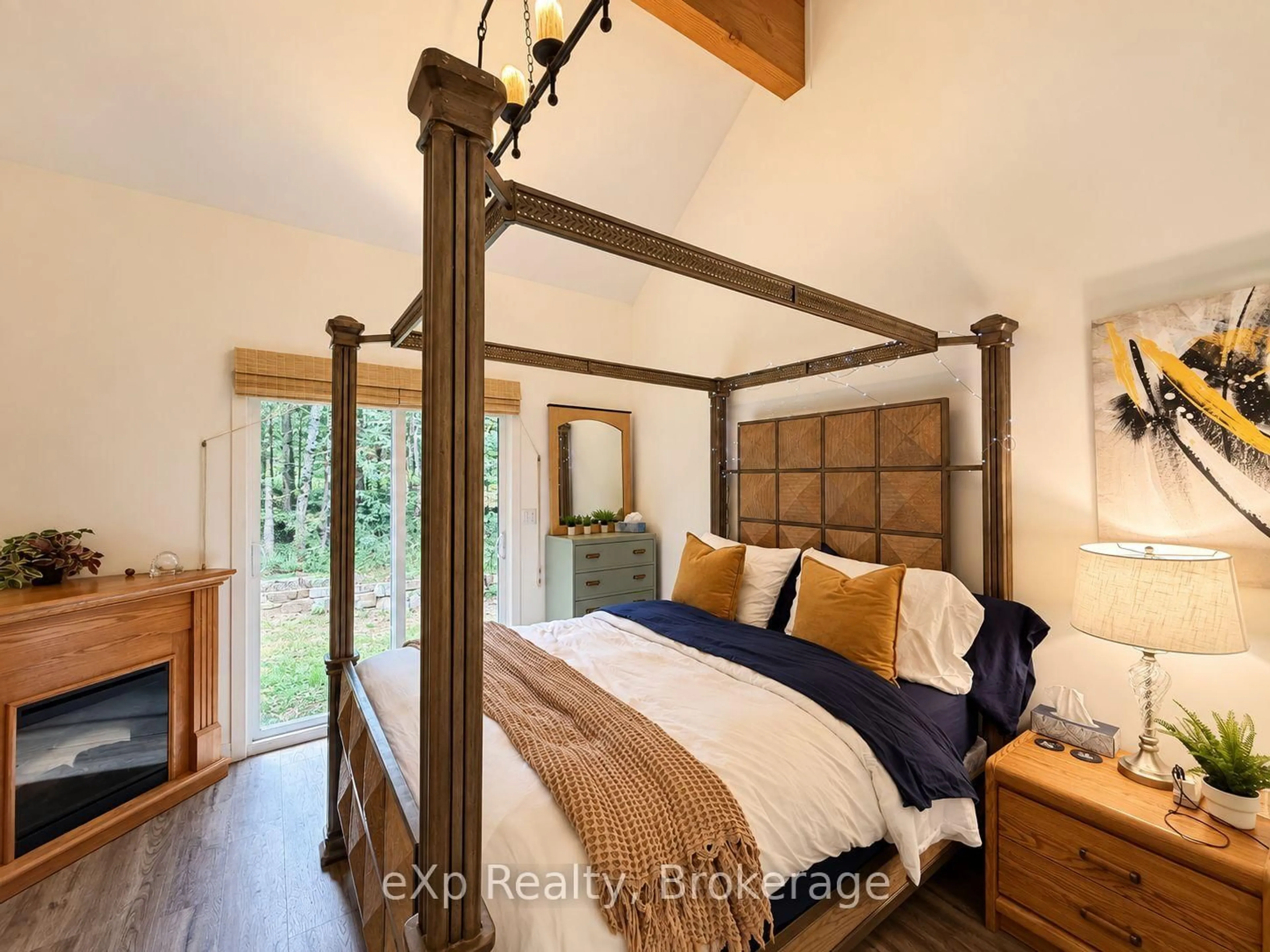 Bedroom with bed, wood/laminate floor for 422 Balsam Chutes Rd, Huntsville Ontario P0B 1L0