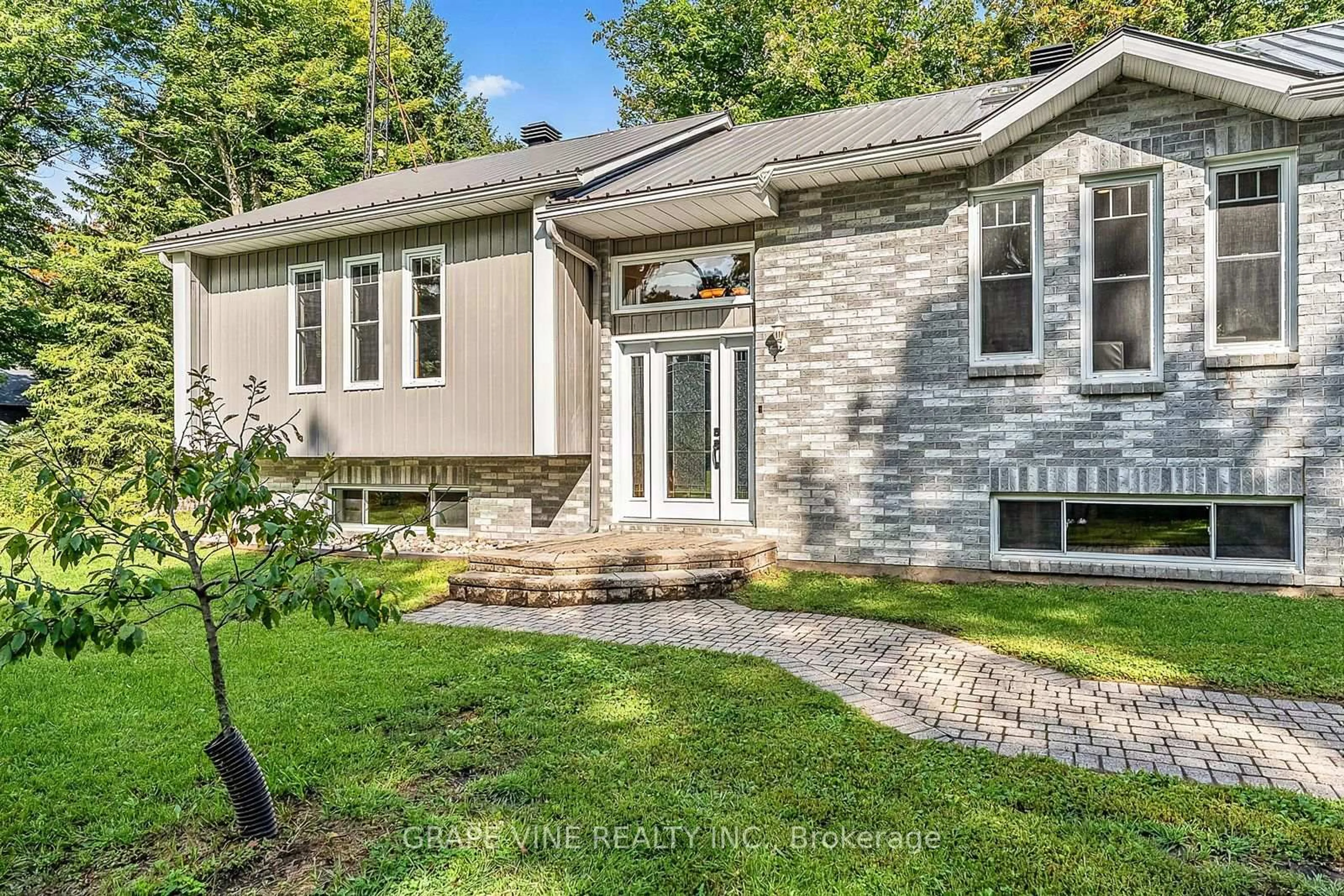 Home with brick exterior material, street for 1951 Concession 7 Rd, Alfred and Plantagenet Ontario K0B 1C0