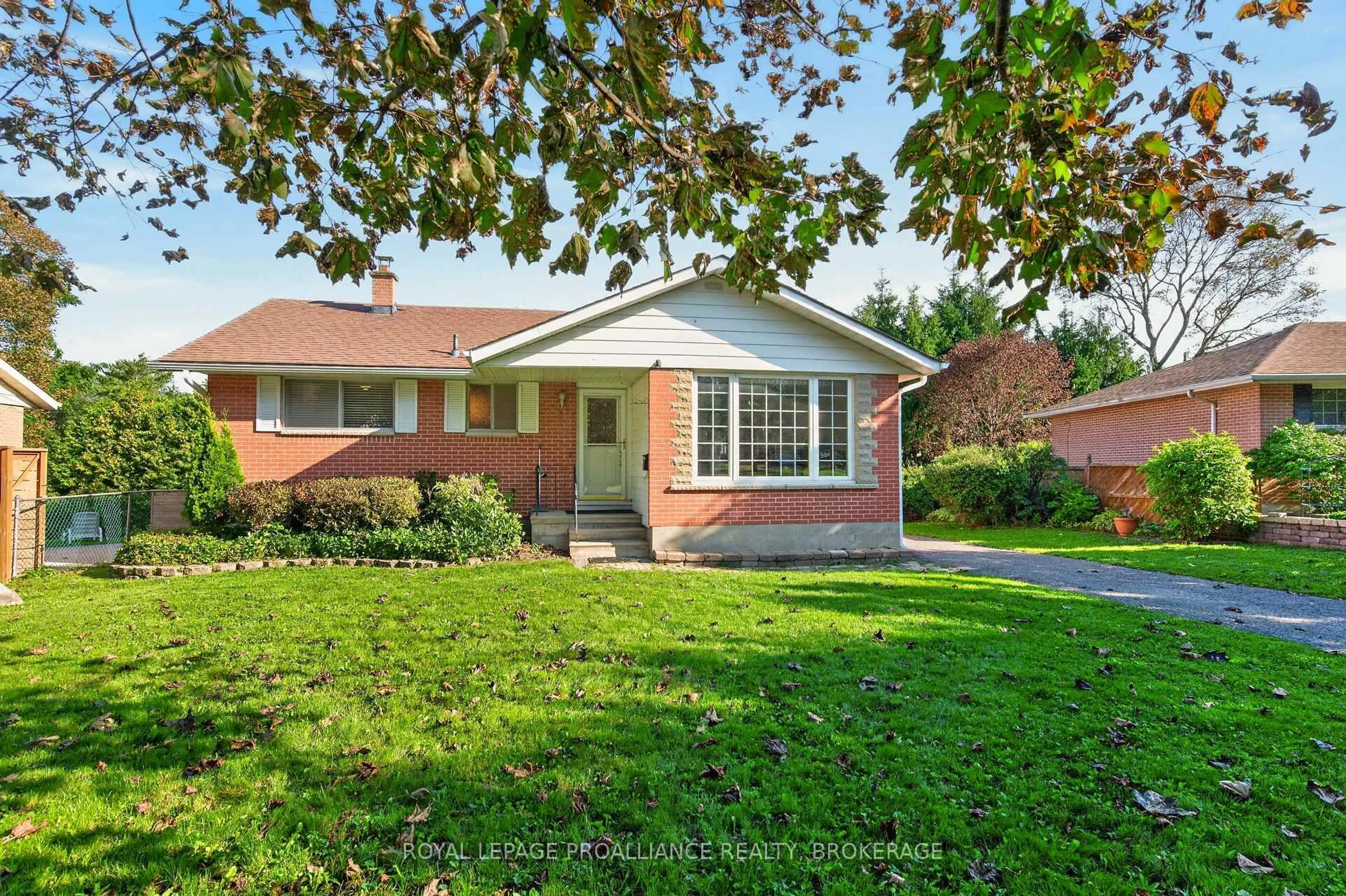 Home with brick exterior material, street for 15 Hampstead, Kingston Ontario K7M 3J1