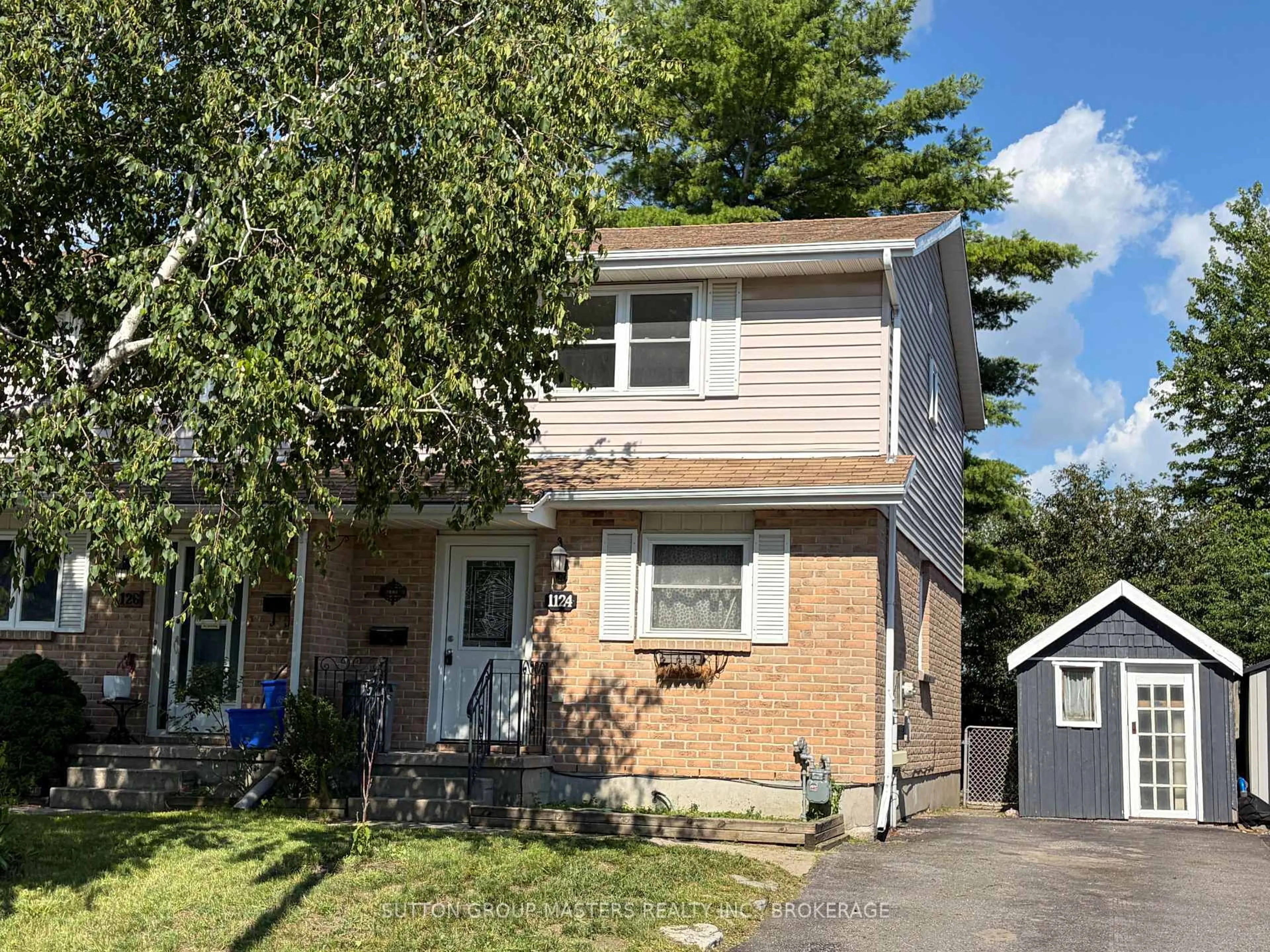 Home with vinyl exterior material, street for 1124 Bittersweet Pl, Kingston Ontario K7P 2G9