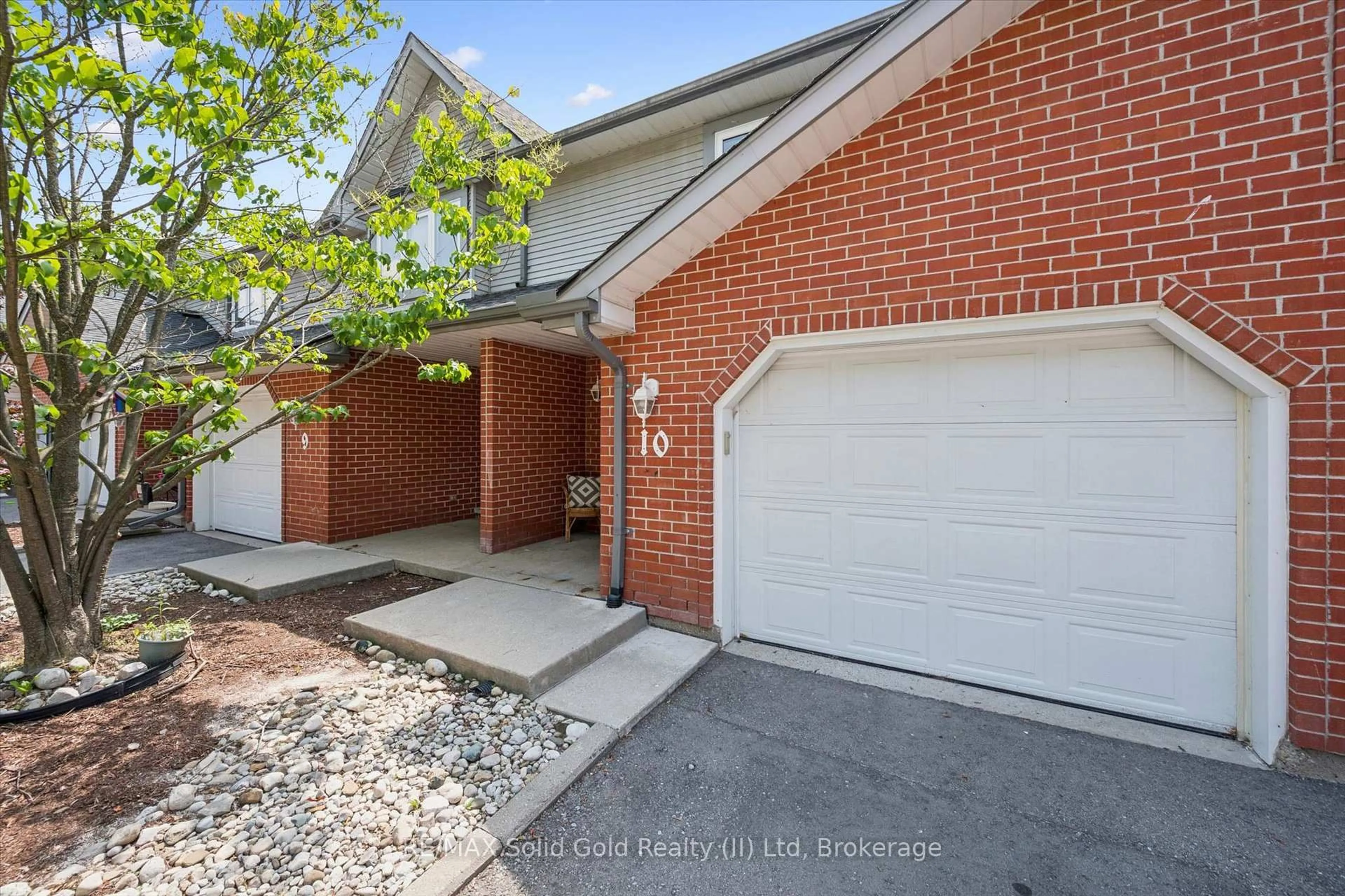 Home with brick exterior material, street for 89 Woolwich St #10, Waterloo Ontario N2K 1S5