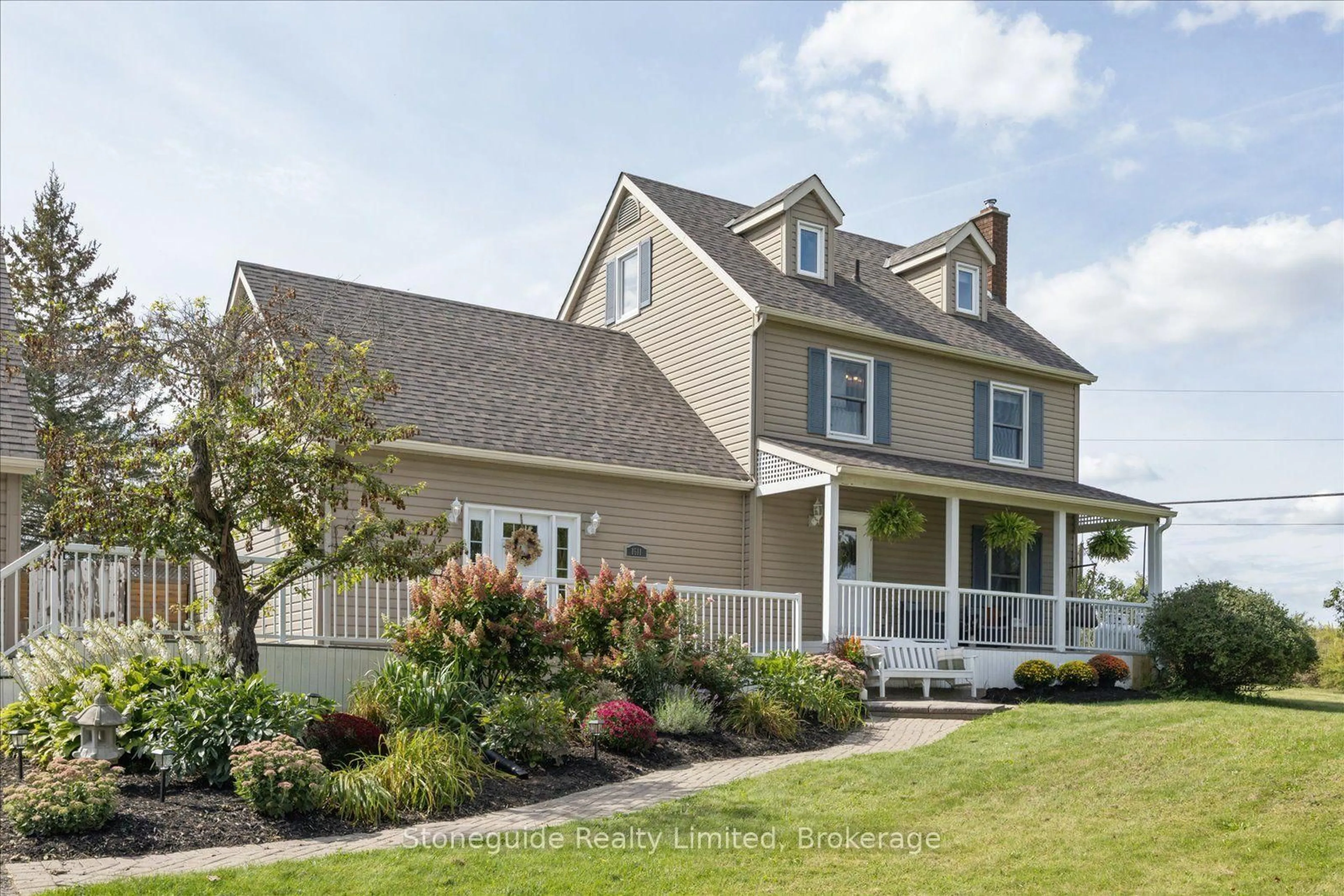 Home with vinyl exterior material, street for 1611 Parkhill Rd, Cavan Monaghan Ontario K9J 0E5