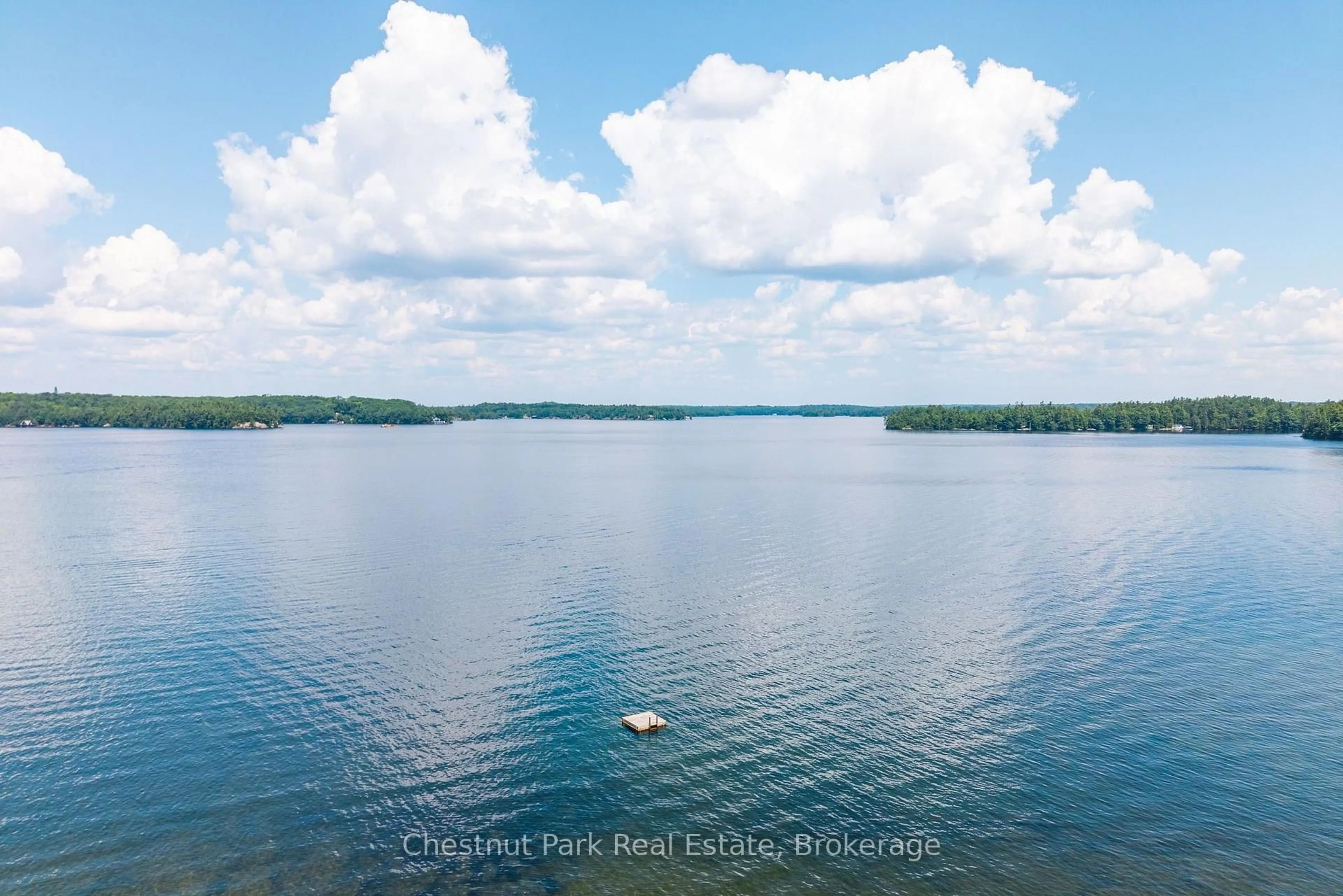 A pic from outside/outdoor area/front of a property/back of a property/a pic from drone, water/lake/river/ocean view for 4916 Muskoka Rd 169 Rd #7, Muskoka Lakes Ontario P0C 1H0