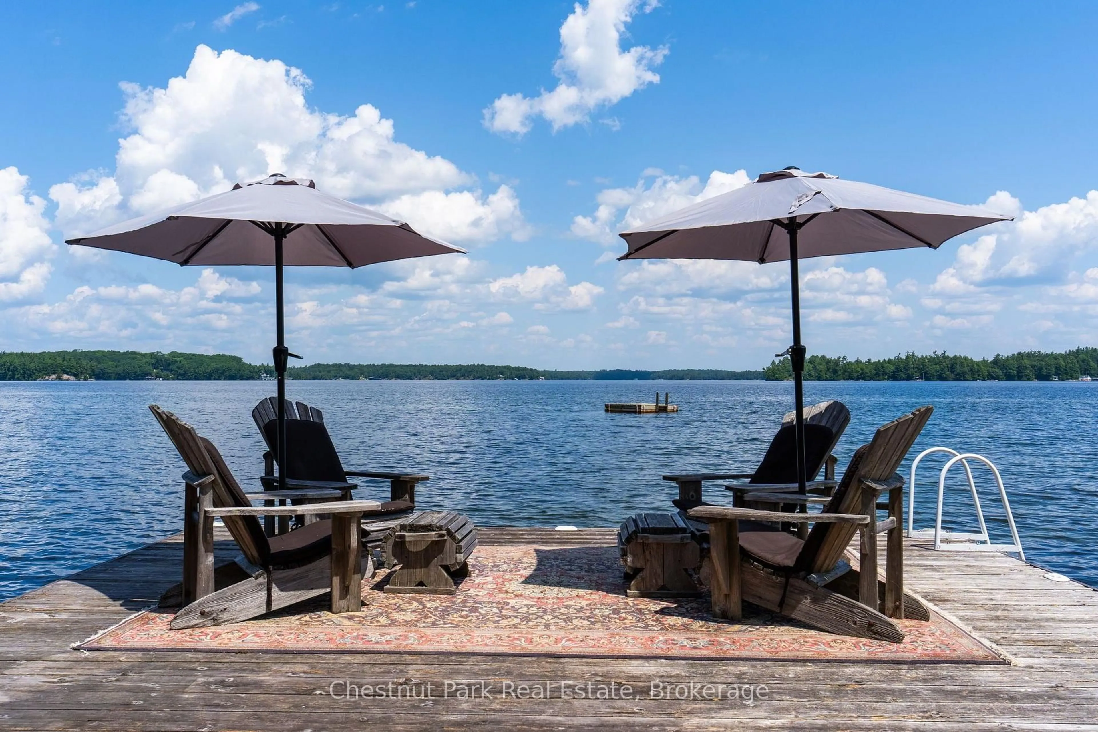 Patio, water/lake/river/ocean view for 4916 Muskoka Rd 169 Rd #7, Muskoka Lakes Ontario P0C 1H0