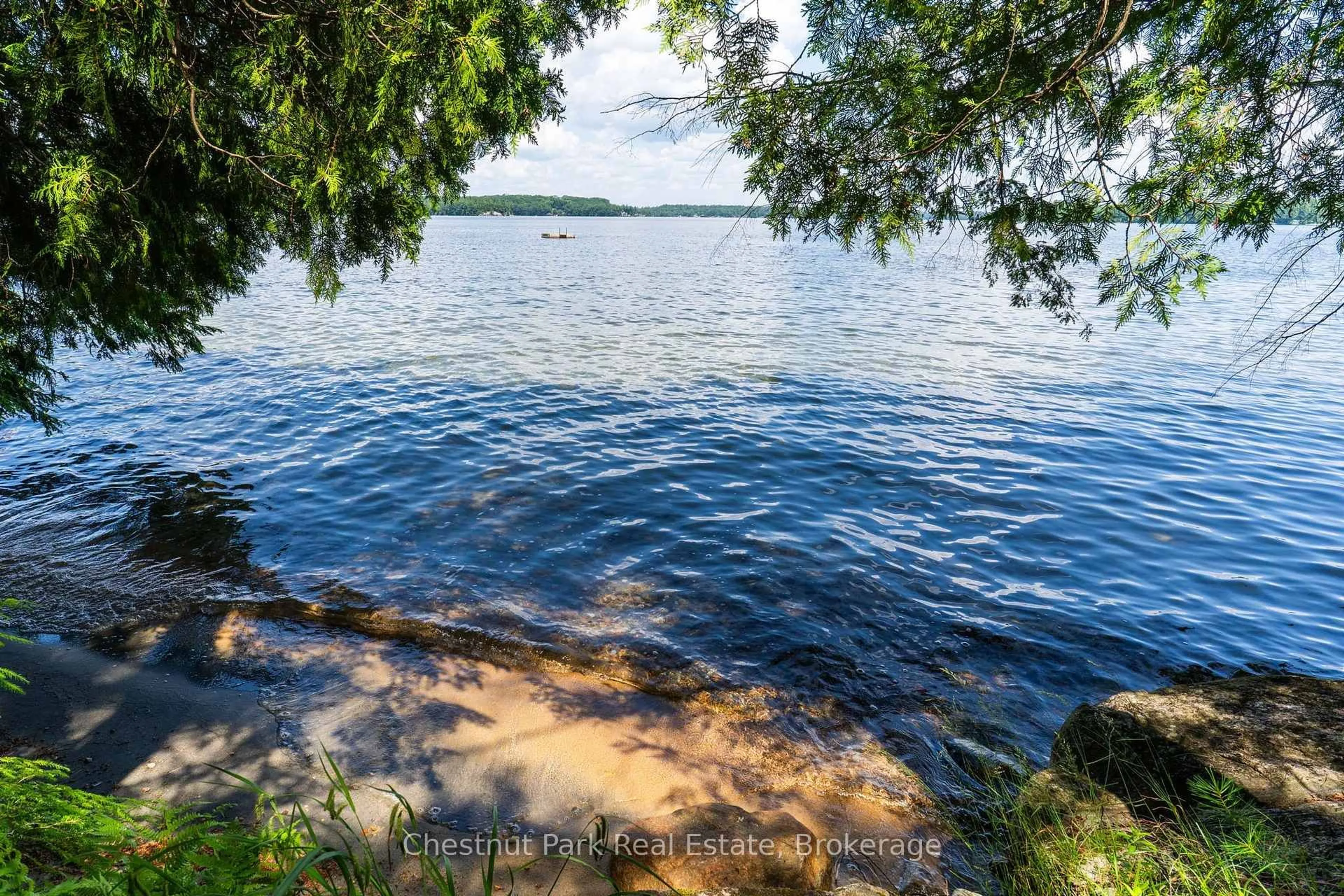 Patio, water/lake/river/ocean view for 4916 Muskoka Rd 169 Rd #7, Muskoka Lakes Ontario P0C 1H0