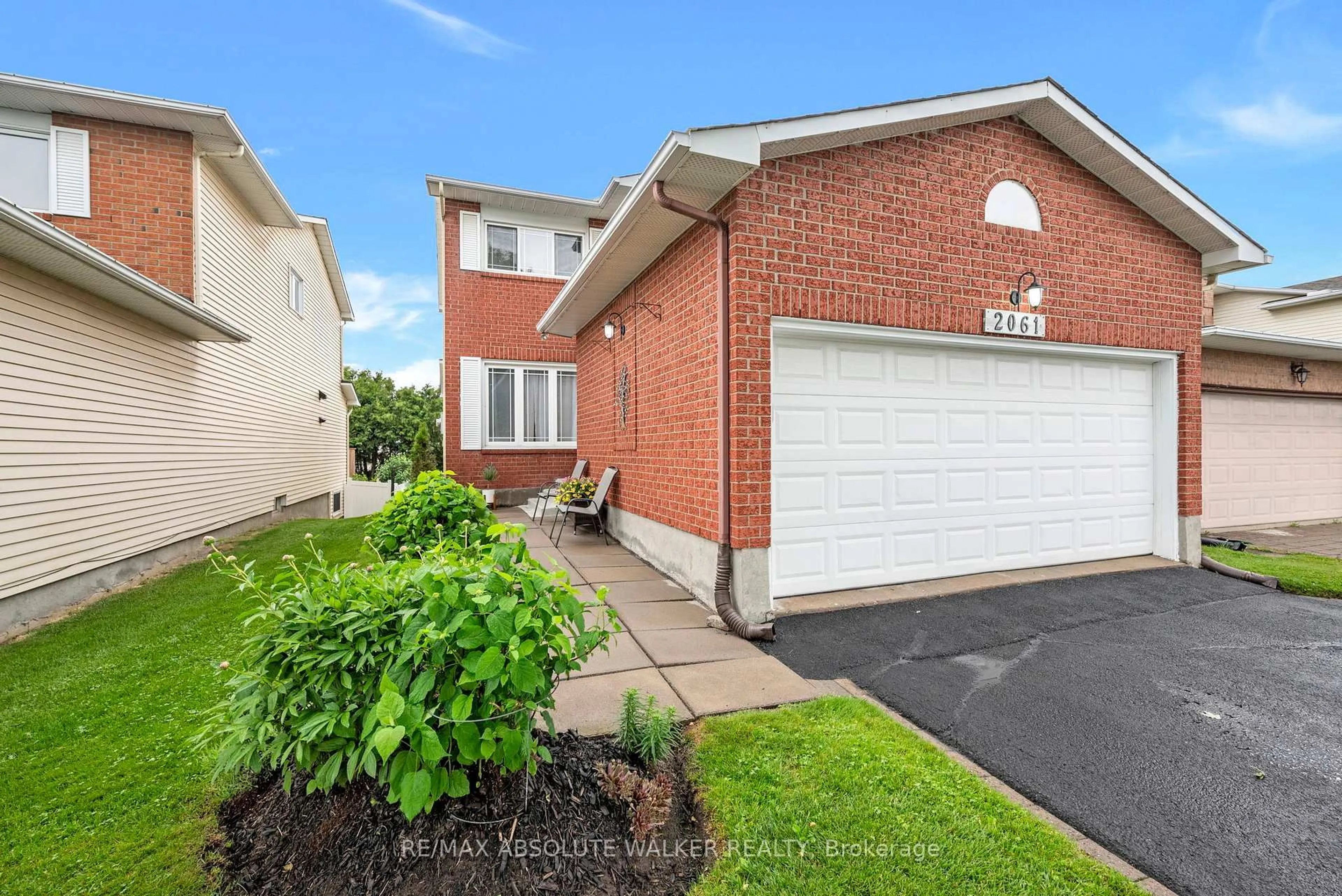 Home with brick exterior material, street for 2061 Legrand Cres, Ottawa Ontario K1E 3R1