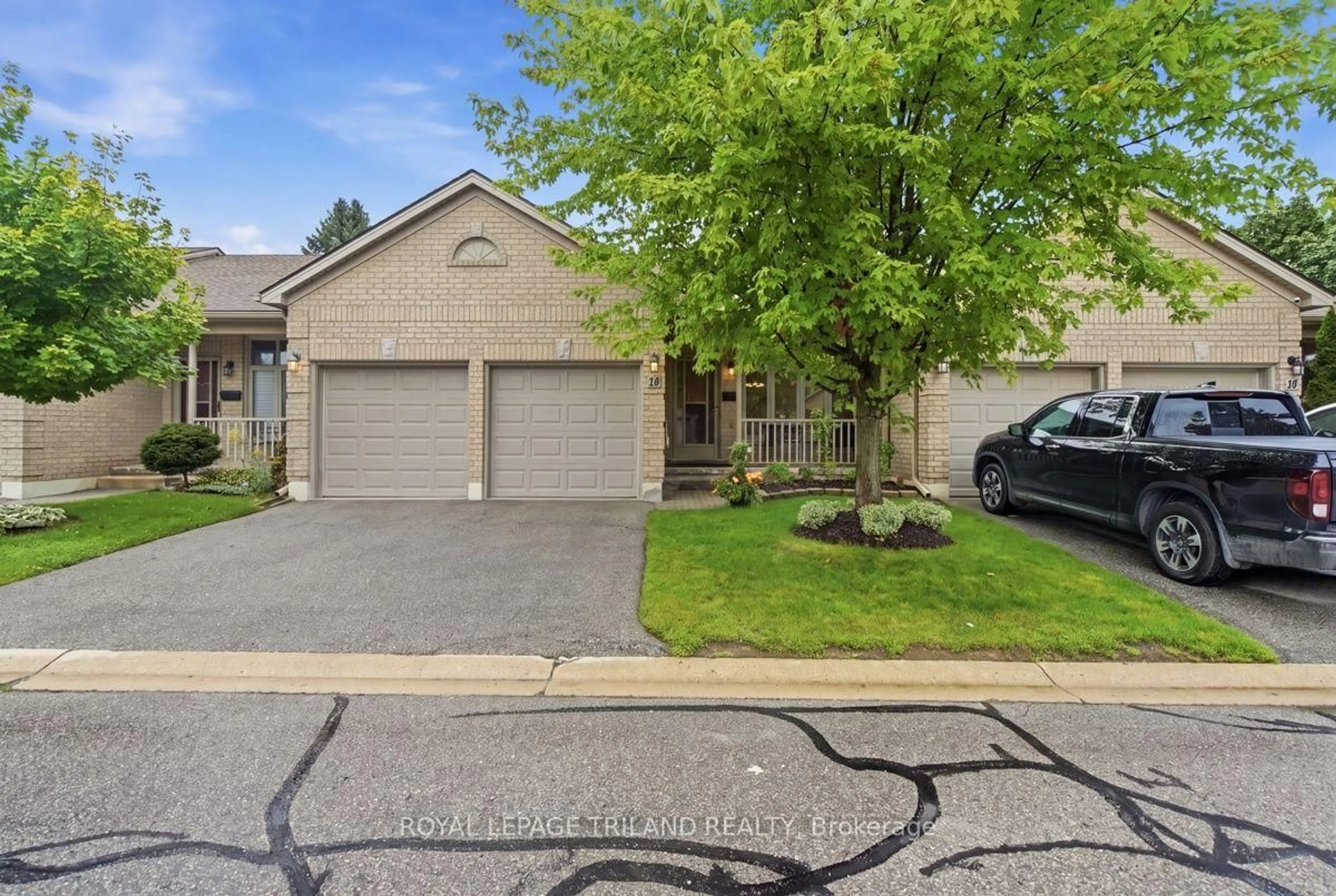 A pic from outside/outdoor area/front of a property/back of a property/a pic from drone, street for 9 Cadeau Terr #16, London South Ontario N6K 4T5