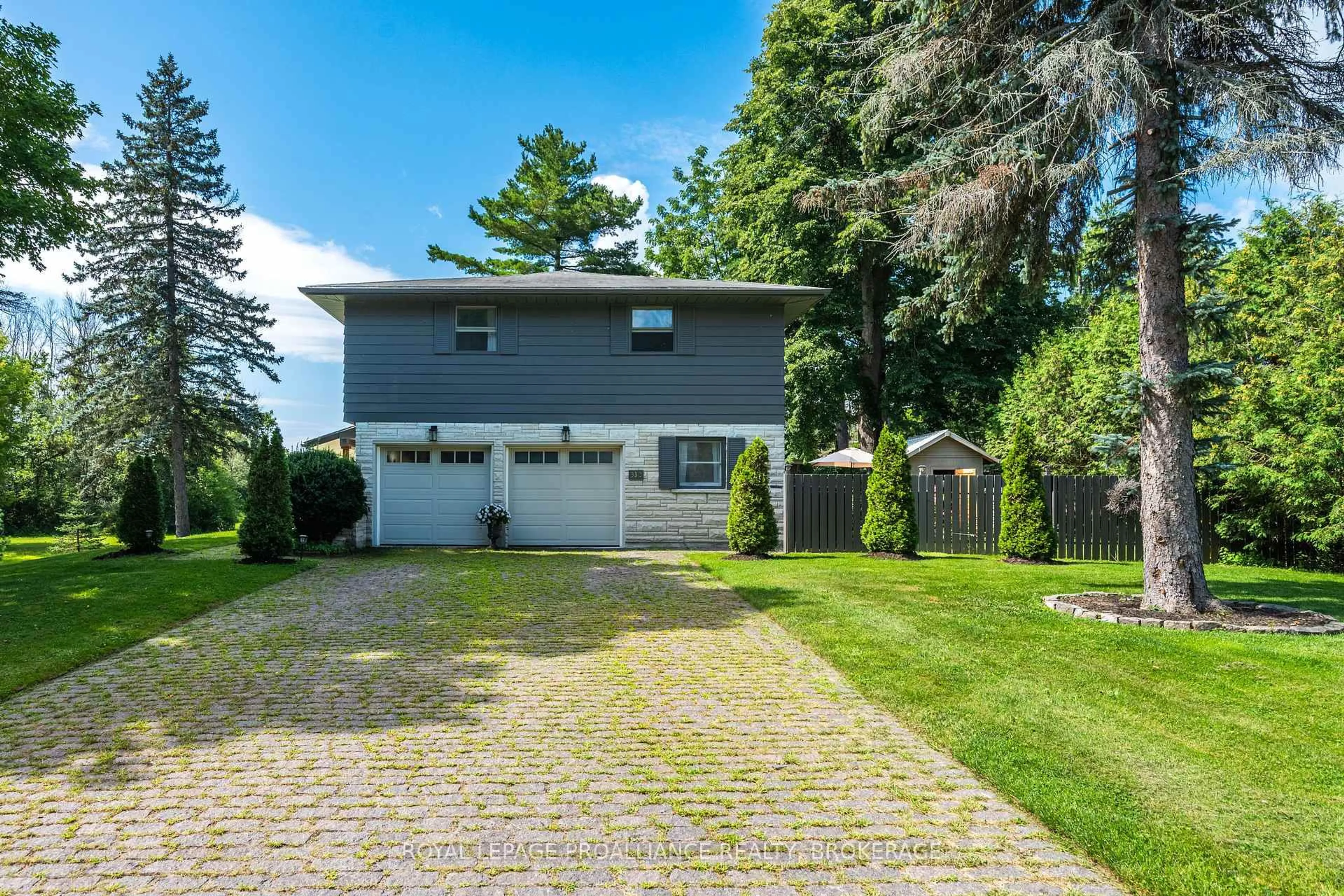 A pic from outside/outdoor area/front of a property/back of a property/a pic from drone, street for 330 Elmwood Dr, Gananoque Ontario K7G 1P1