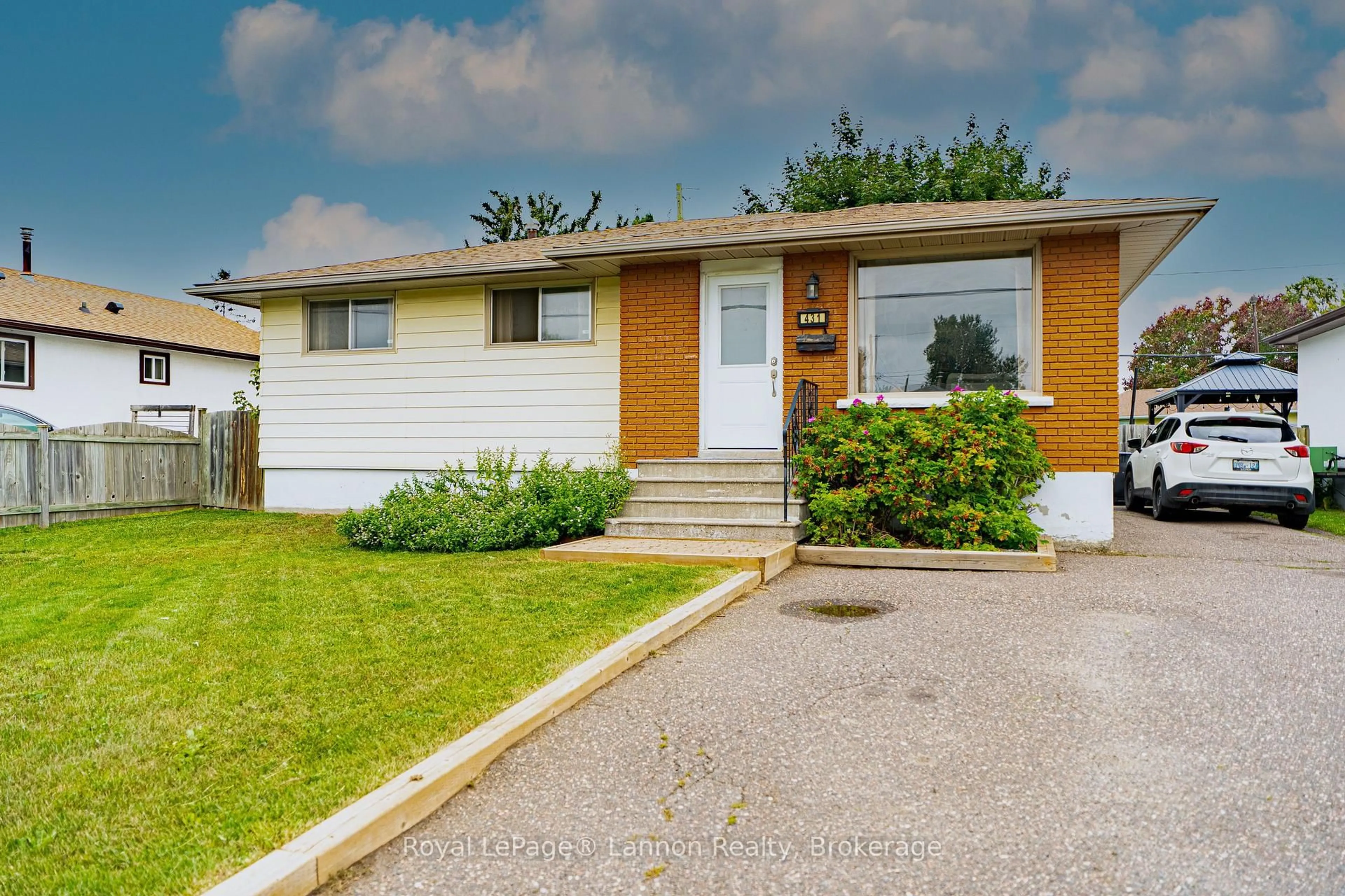 Home with vinyl exterior material, street for 431 Churchill Dr, Thunder Bay Ontario P7C 1V8