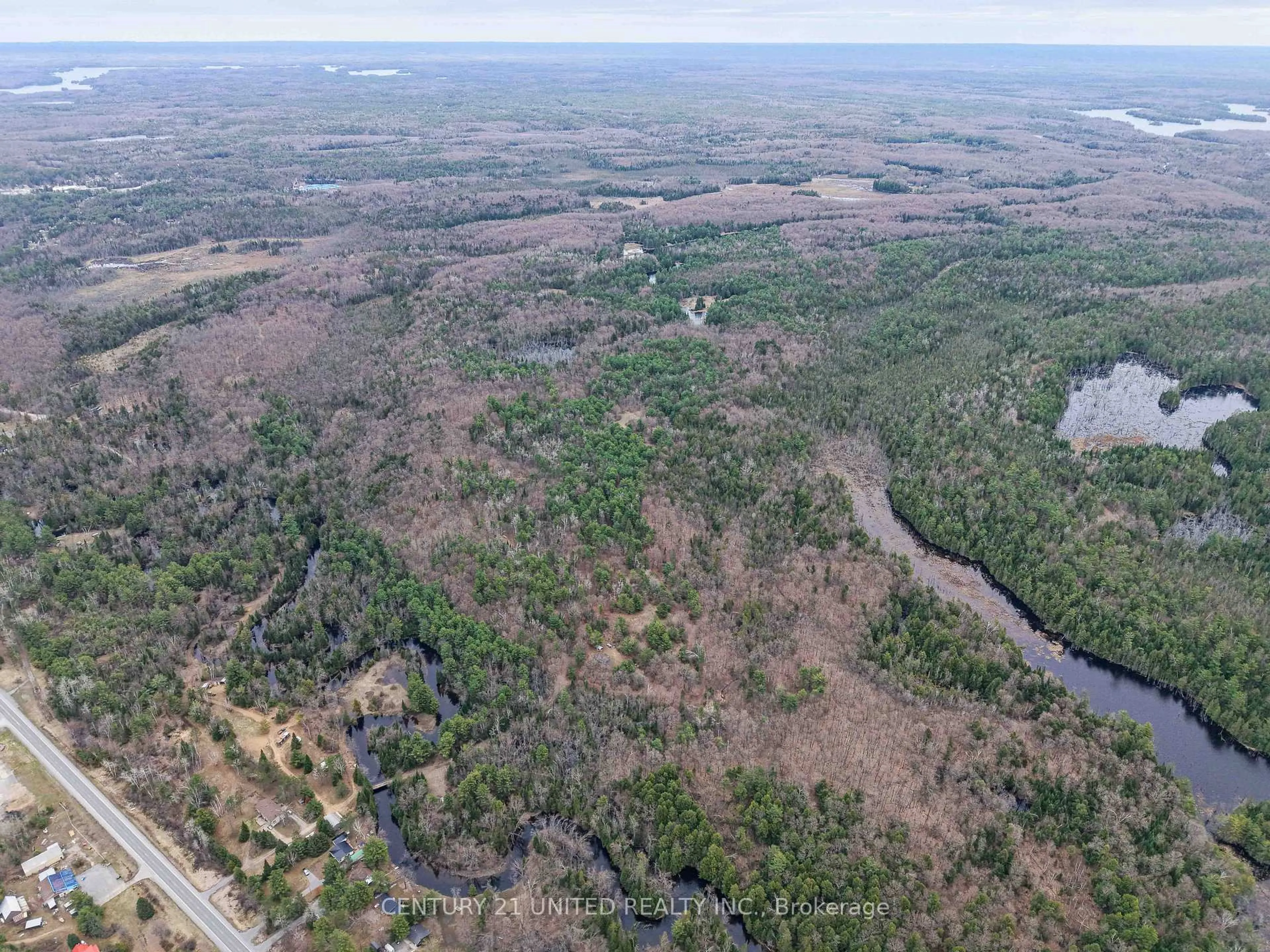 A pic from outside/outdoor area/front of a property/back of a property/a pic from drone, forest/trees view for 9559 Hwy 28, North Kawartha Ontario K0L 1A0
