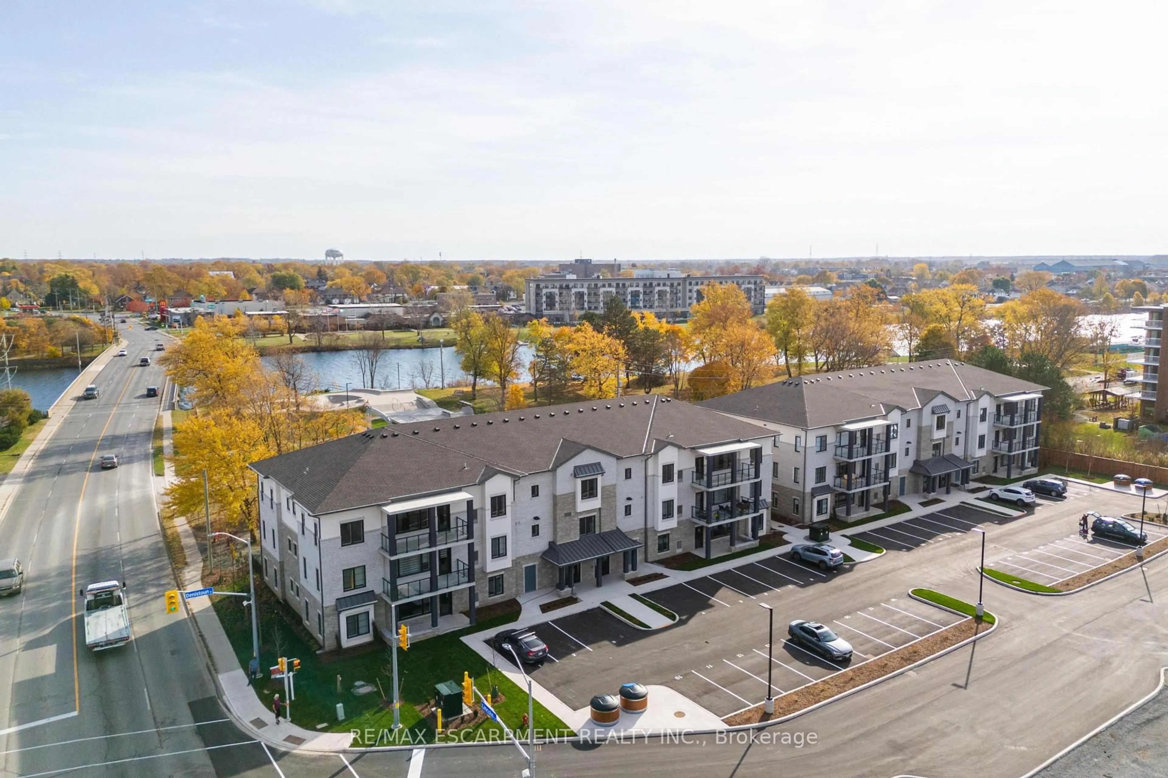 A pic from outside/outdoor area/front of a property/back of a property/a pic from drone, water/lake/river/ocean view for 123 Lincoln St #107, Welland Ontario L3C 0L3