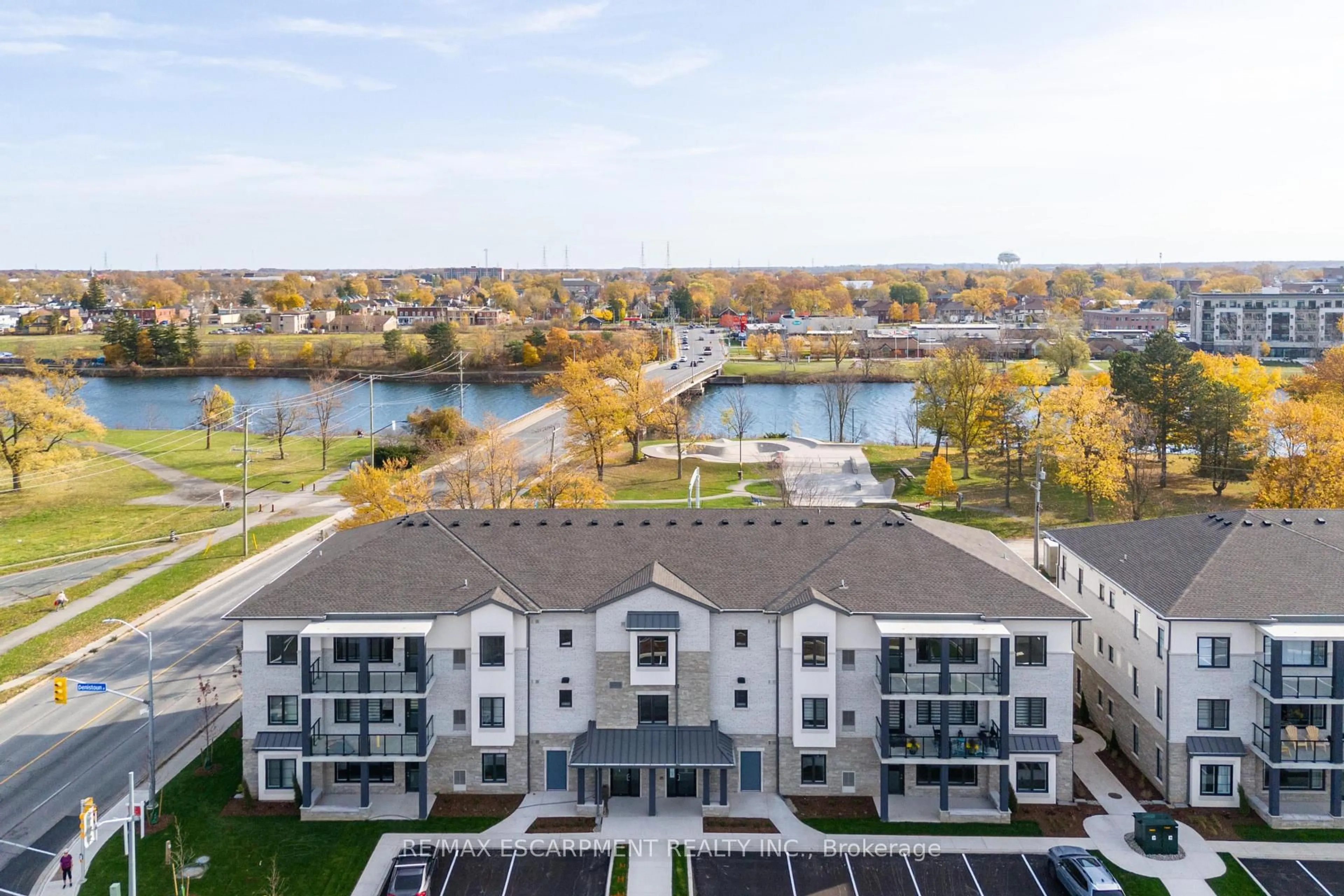 A pic from outside/outdoor area/front of a property/back of a property/a pic from drone, water/lake/river/ocean view for 123 Lincoln St #107, Welland Ontario L3C 0L3