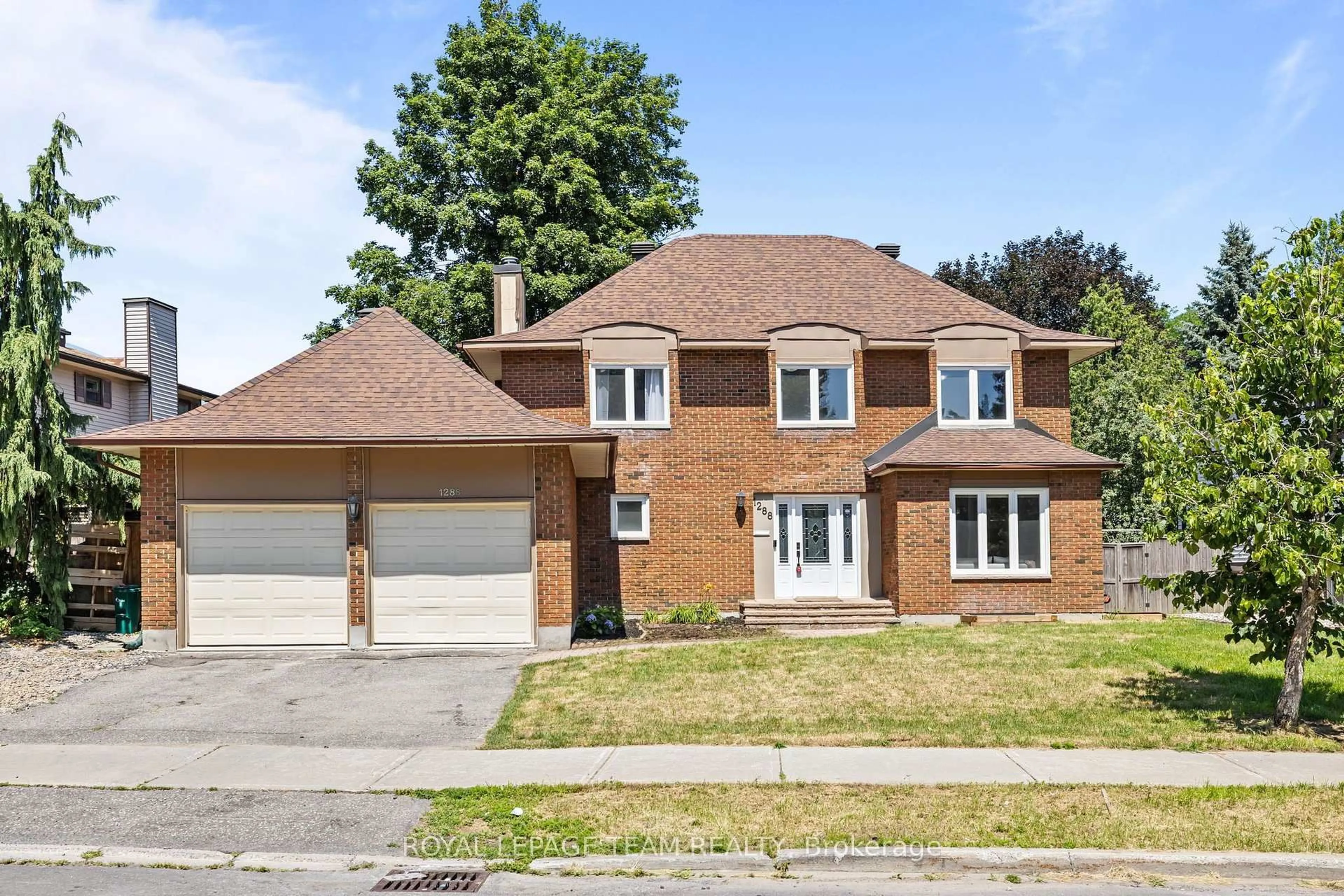 Home with brick exterior material, street for 1288 Plante Dr, Ottawa Ontario K1V 9G2