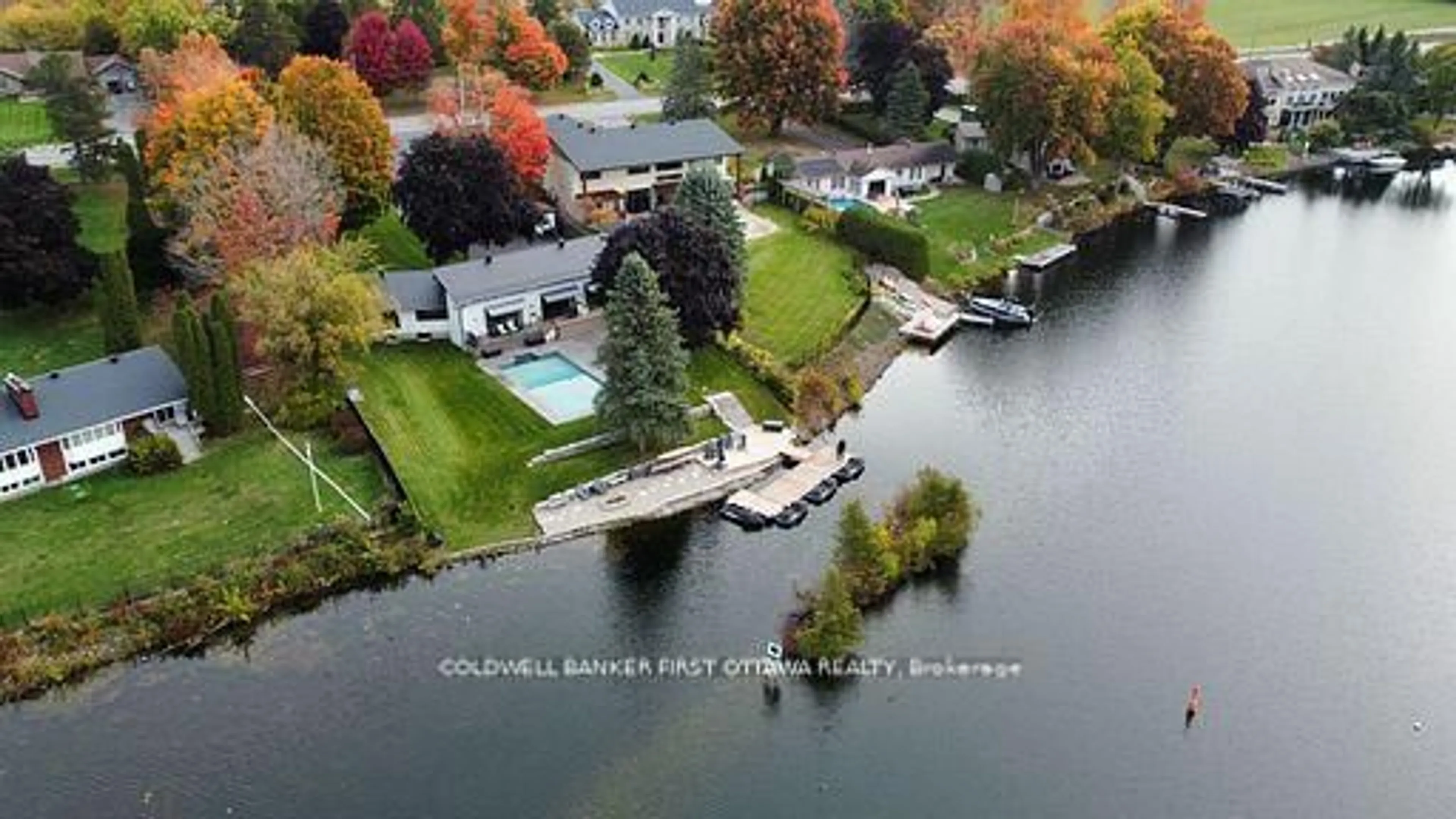A pic from outside/outdoor area/front of a property/back of a property/a pic from drone, water/lake/river/ocean view for 1060 River Rd, Ottawa Ontario K4M 1B4