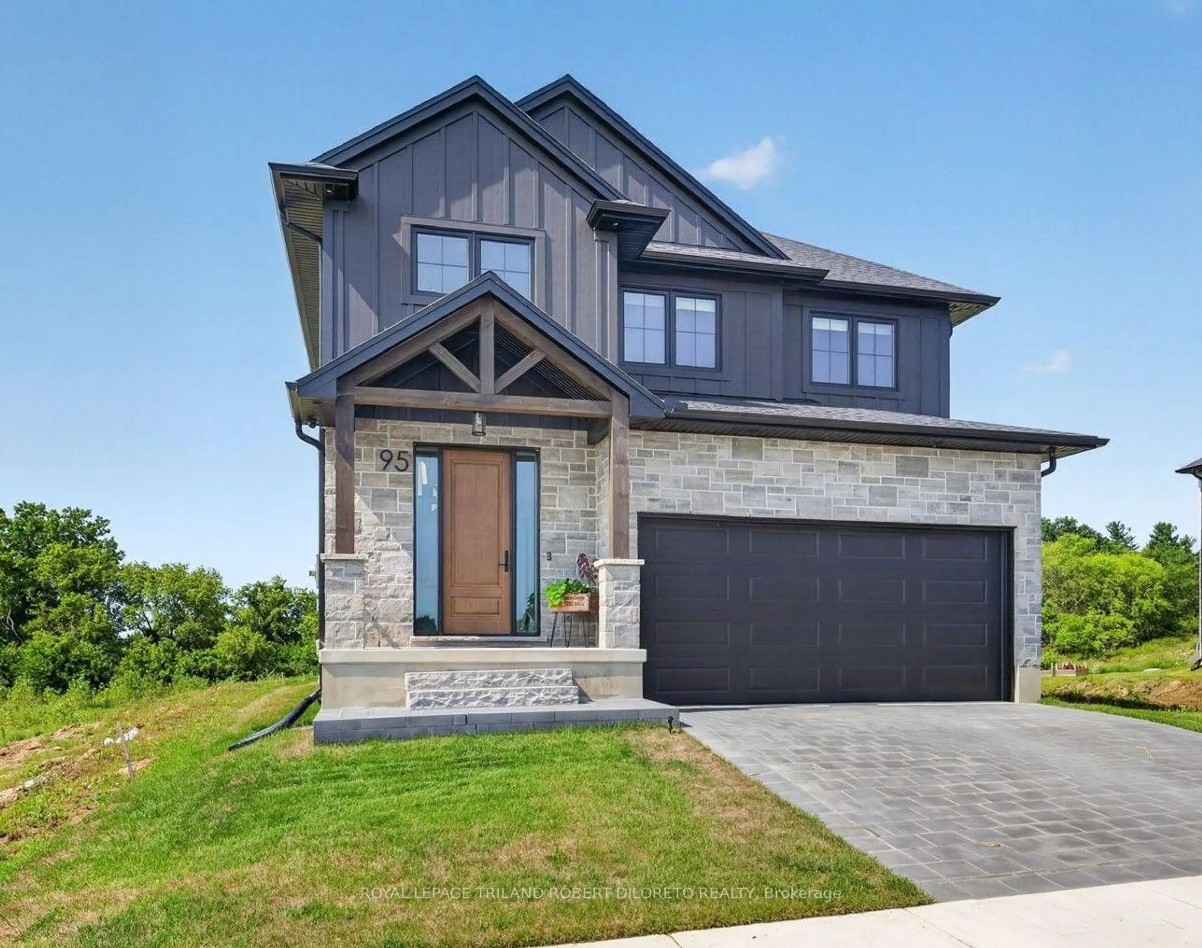 Home with brick exterior material, street for 95 Allister Dr, Middlesex Centre Ontario N0L 1R0