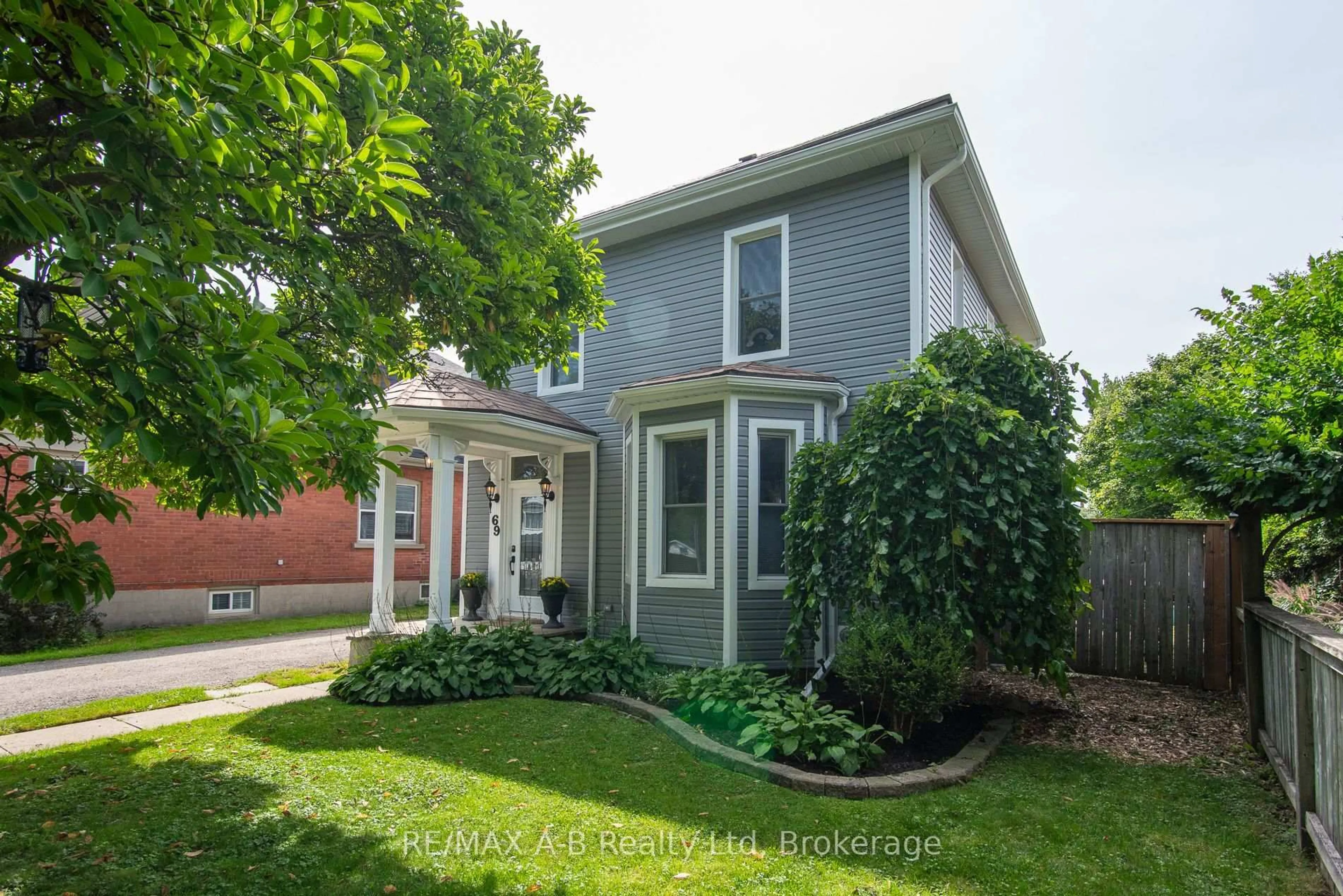 Home with vinyl exterior material, street for 69 Louise St, Stratford Ontario N5A 2E3