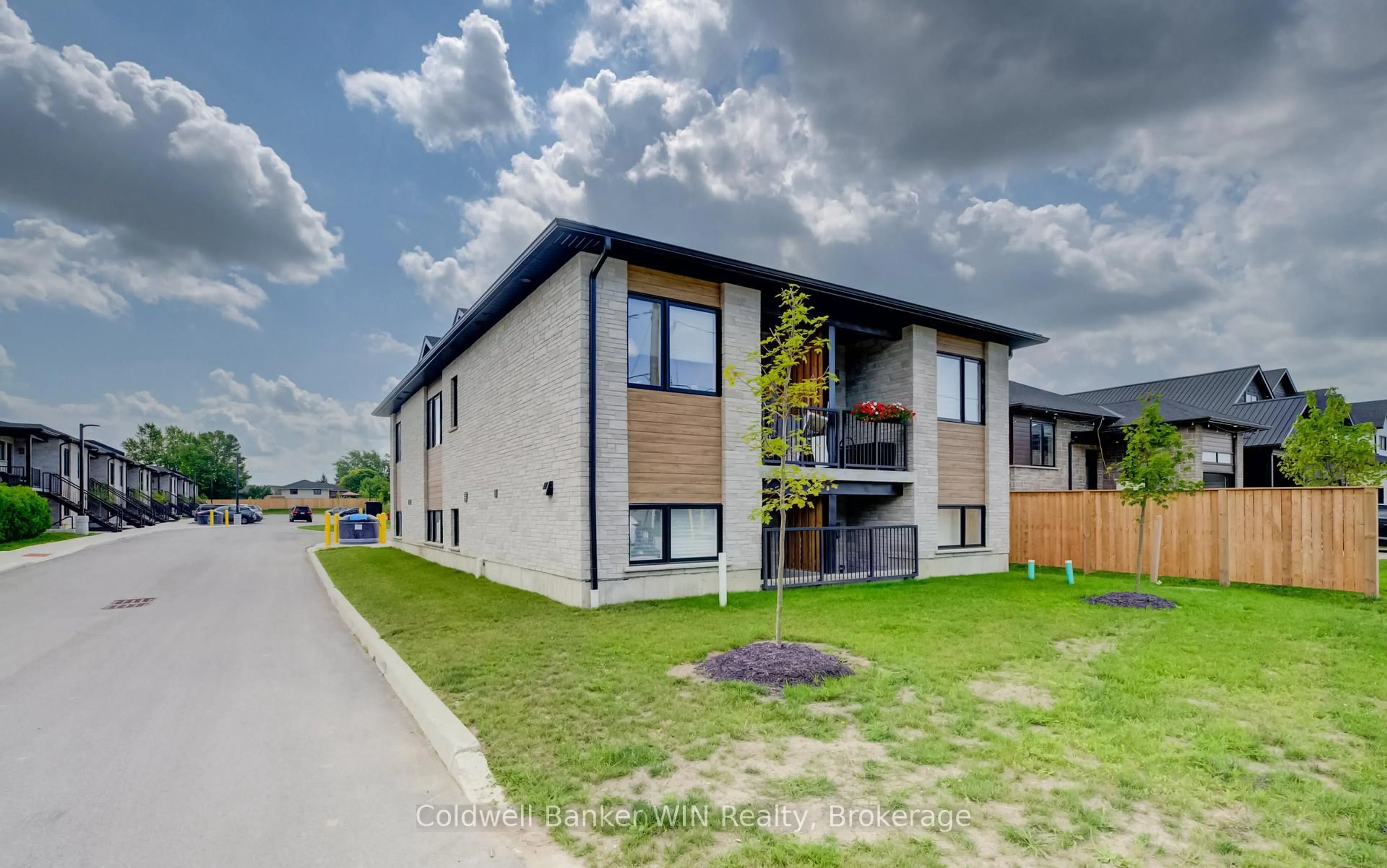 A pic from outside/outdoor area/front of a property/back of a property/a pic from drone, street for 440 Wellington St #3, Wellington North Ontario N0G 2L2