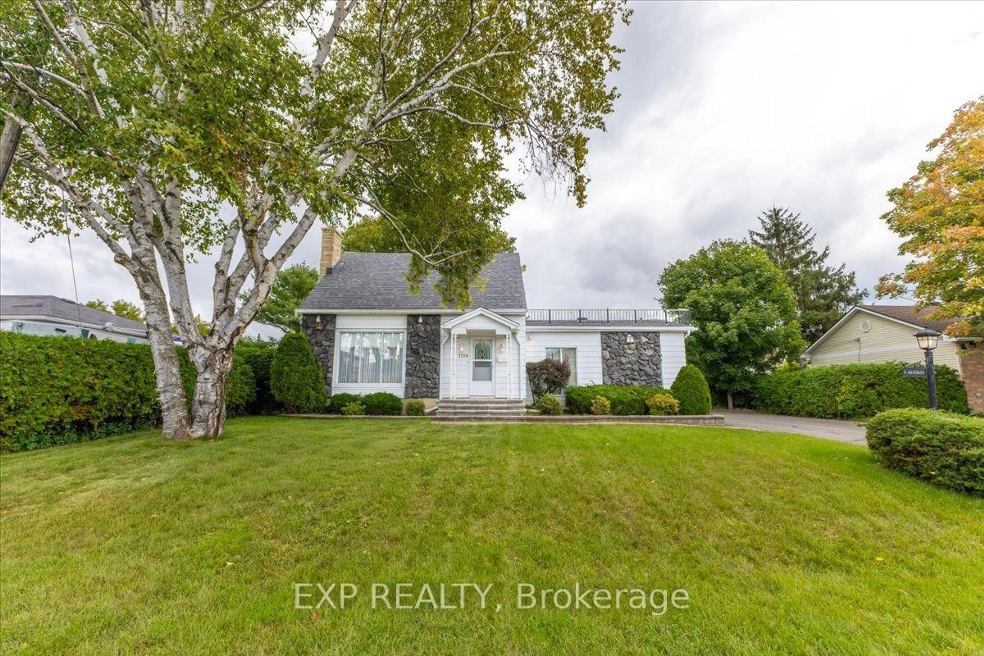 A pic from outside/outdoor area/front of a property/back of a property/a pic from drone, street for 1359 Marchand St, Ottawa Ontario K1B 3N7