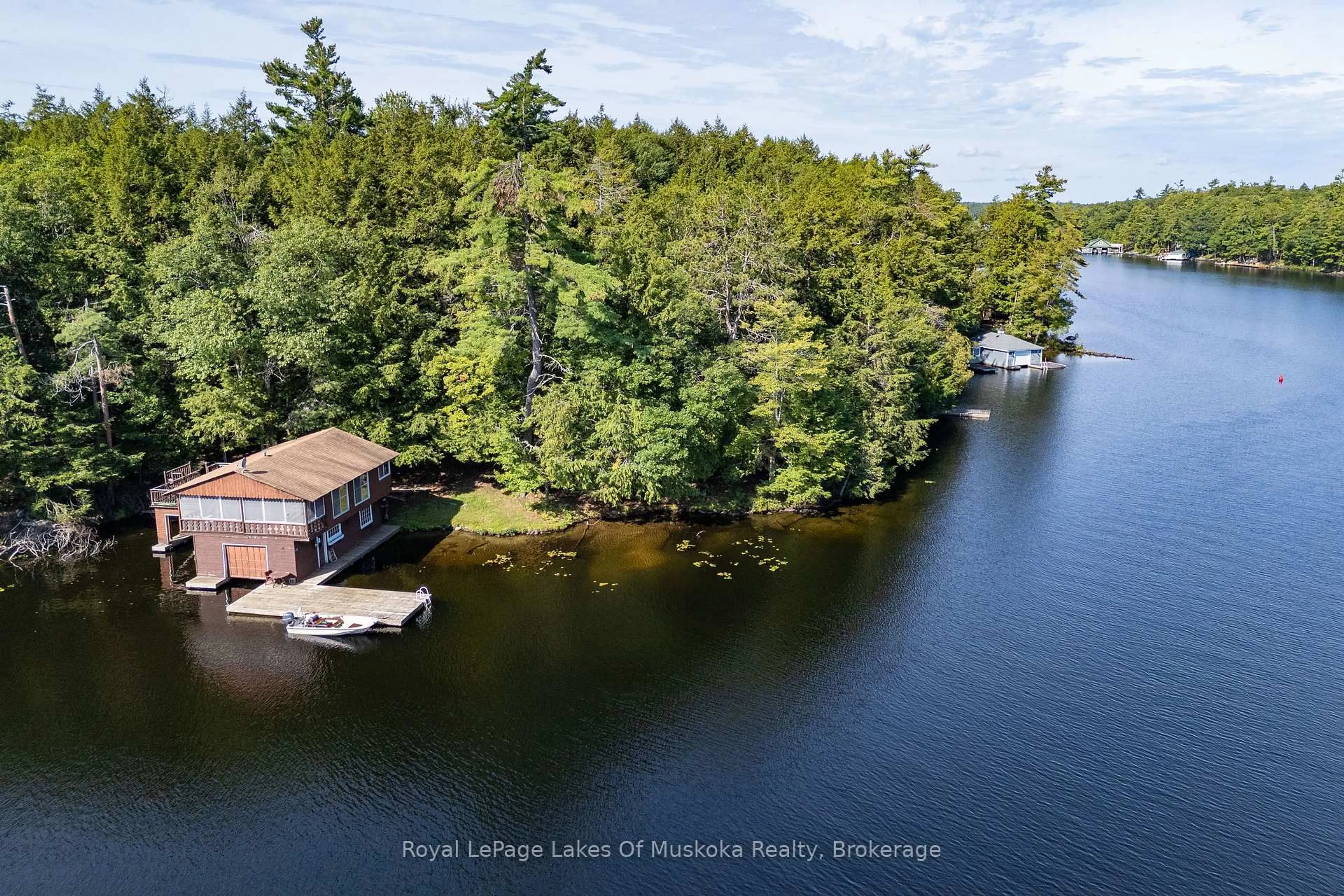 A pic from outside/outdoor area/front of a property/back of a property/a pic from drone, water/lake/river/ocean view for 2115 Lake Muskoka, Muskoka Lakes Ontario P0C 1M0
