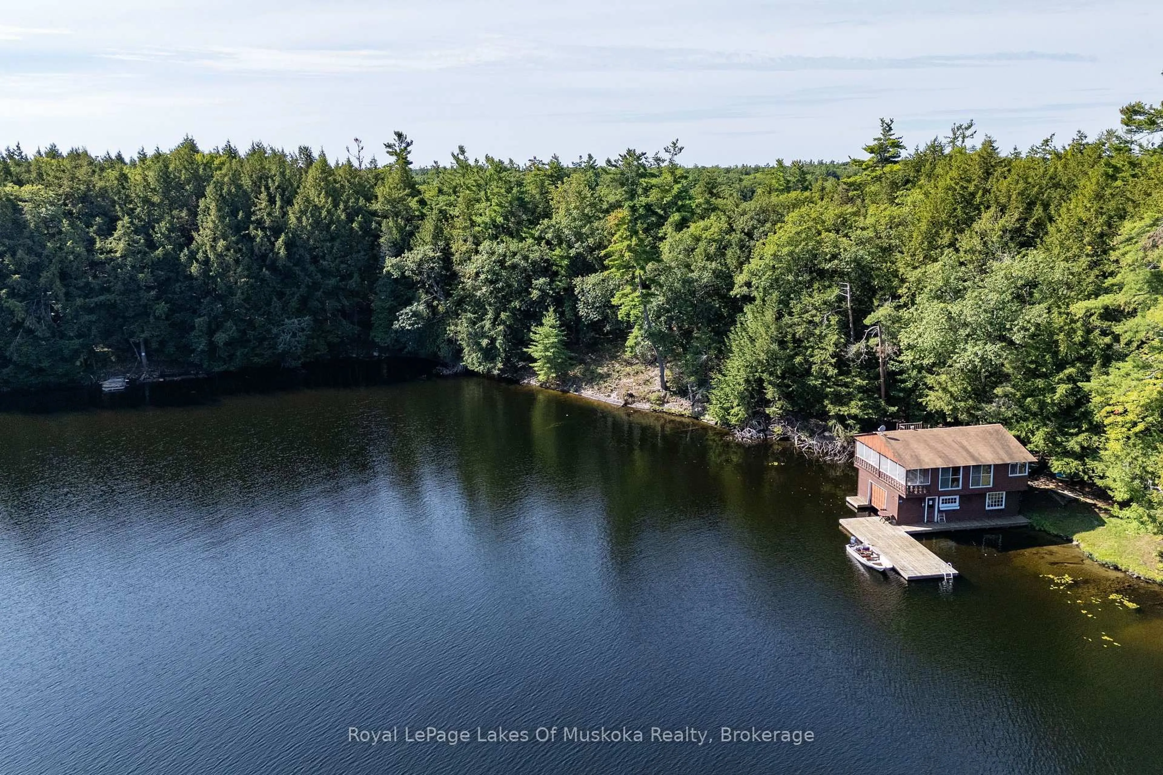 A pic from outside/outdoor area/front of a property/back of a property/a pic from drone, water/lake/river/ocean view for 2115 Lake Muskoka, Muskoka Lakes Ontario P0C 1M0