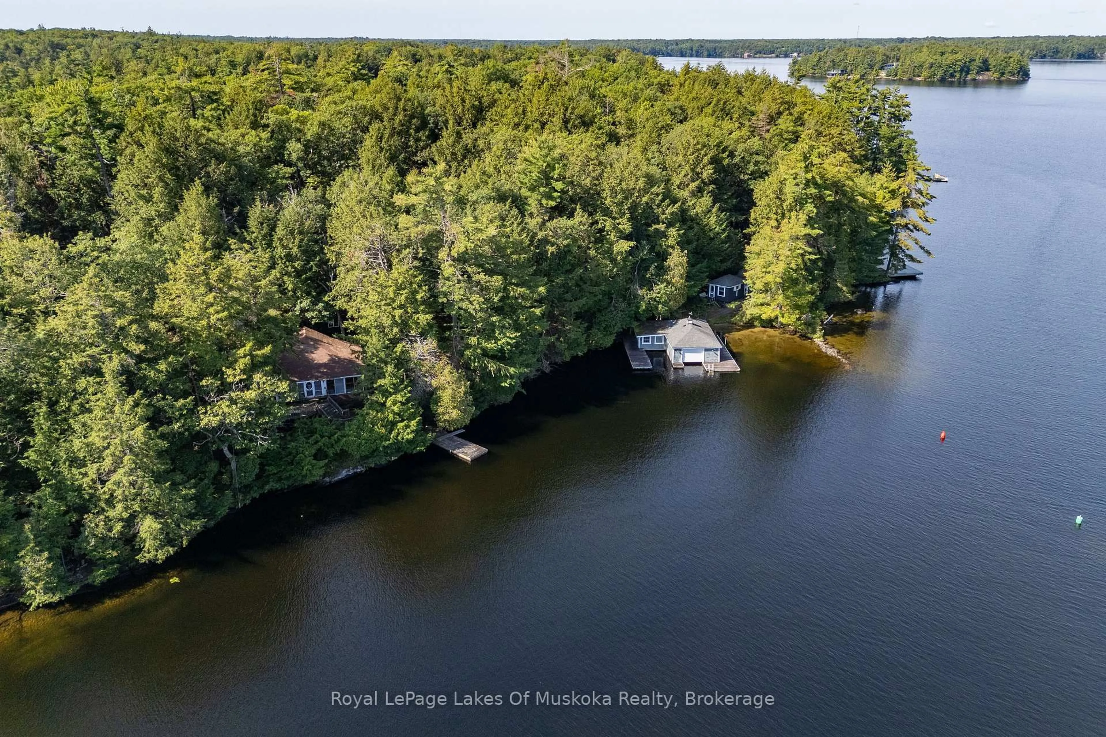 A pic from outside/outdoor area/front of a property/back of a property/a pic from drone, water/lake/river/ocean view for 2115 Lake Muskoka, Muskoka Lakes Ontario P0C 1M0