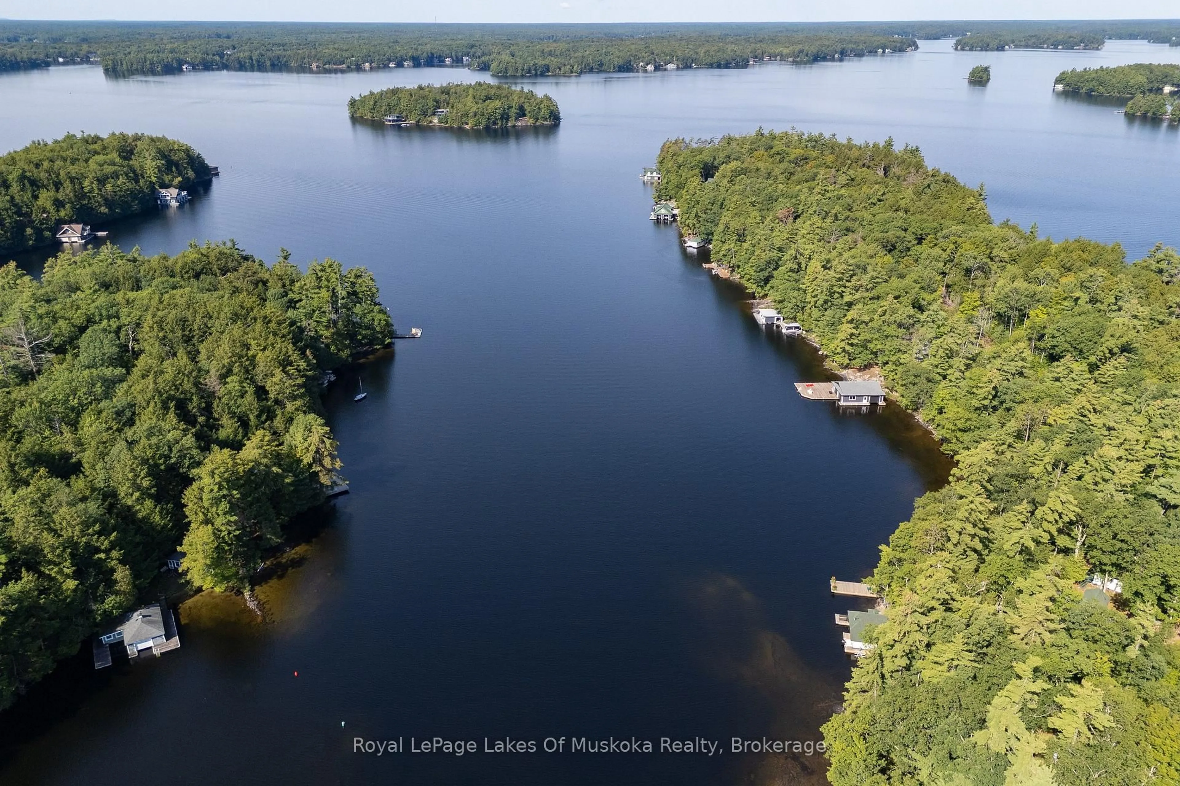 A pic from outside/outdoor area/front of a property/back of a property/a pic from drone, water/lake/river/ocean view for 2115 Lake Muskoka, Muskoka Lakes Ontario P0C 1M0