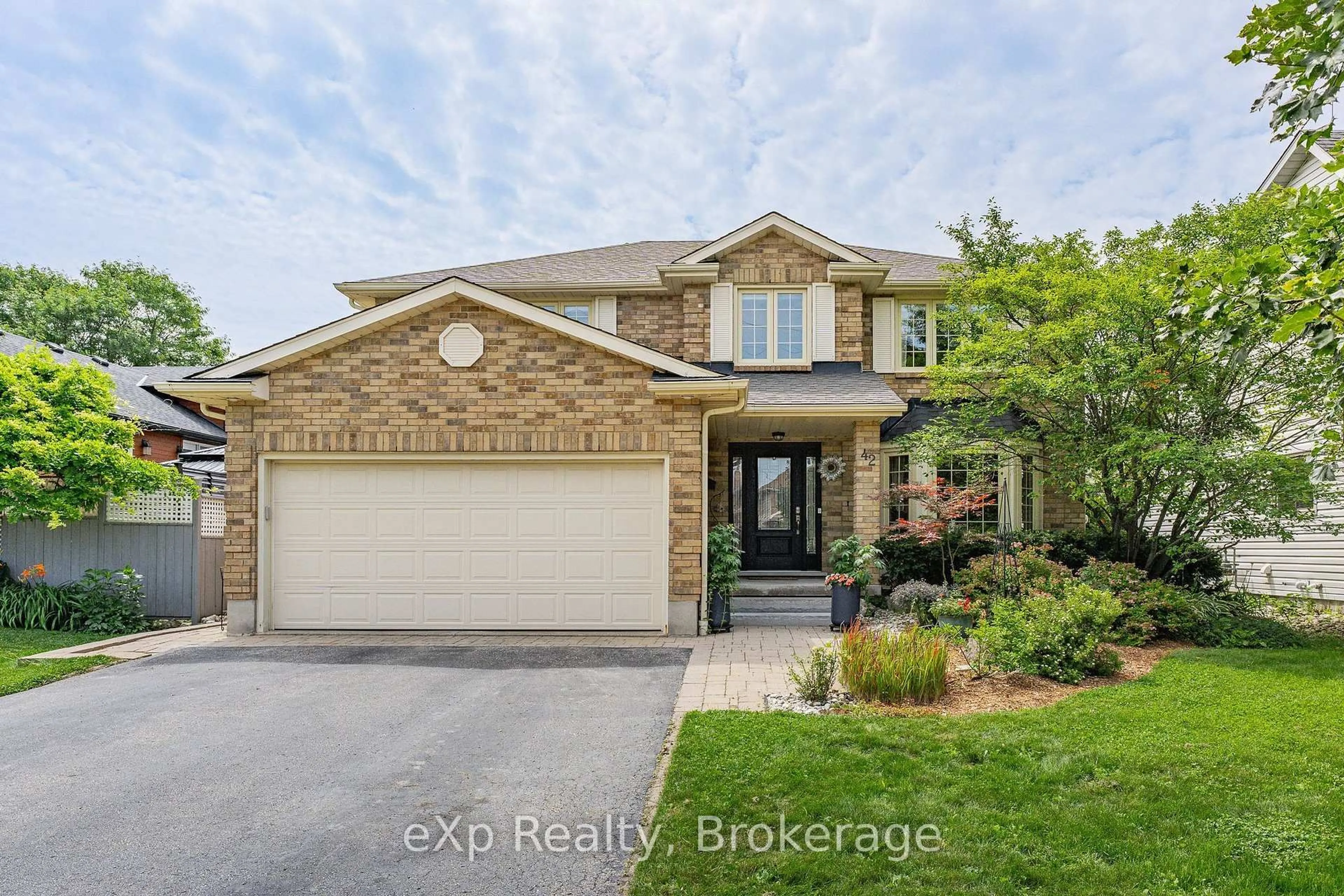 Home with brick exterior material, street for 42 Pacific Pl, Guelph Ontario N1G 4R5