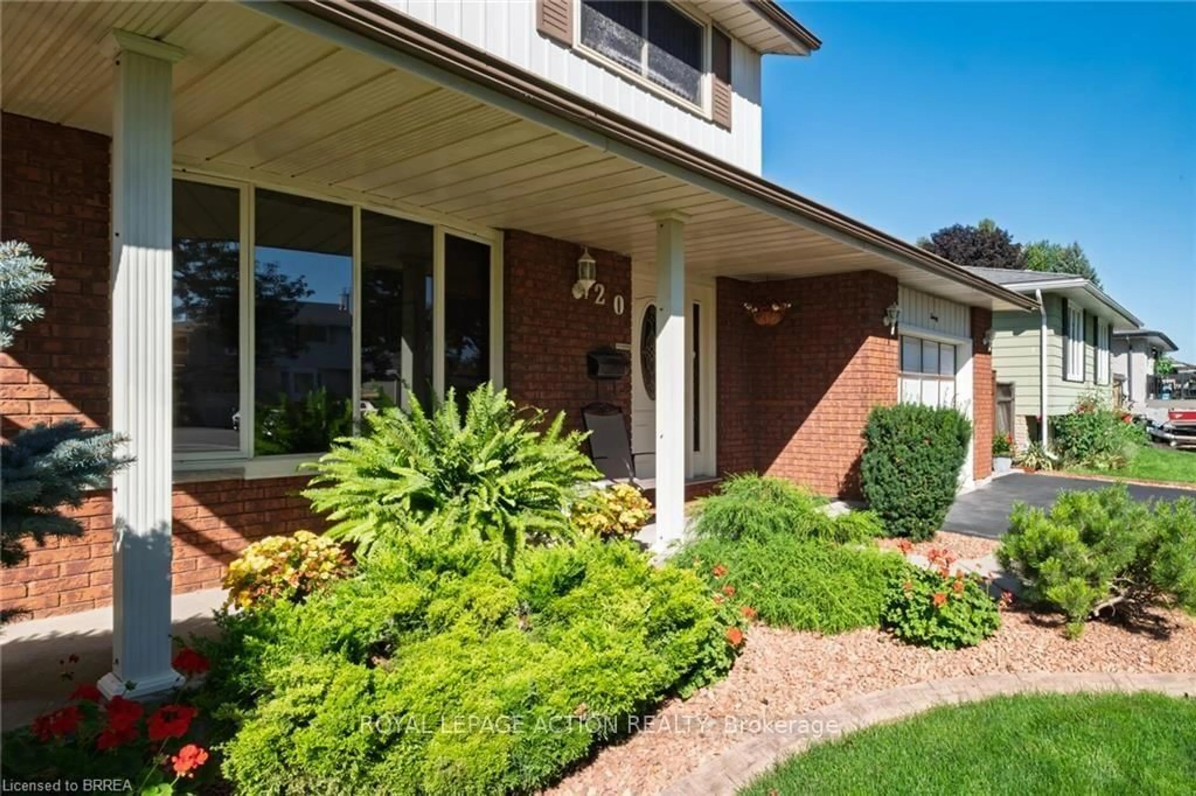 Home with brick exterior material, street for 20 Wildflower Lane, Brantford Ontario N3R 6B4