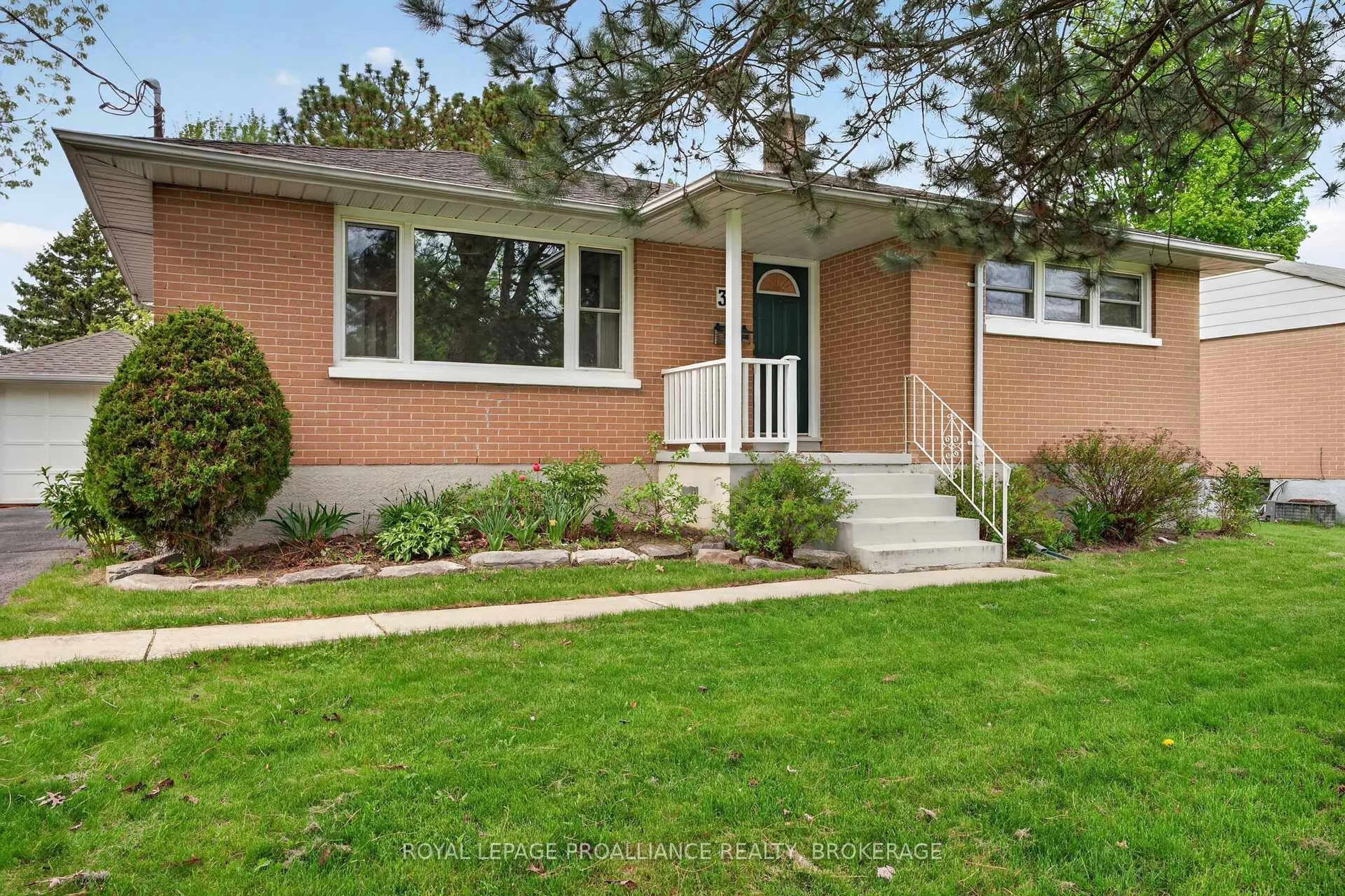 Home with brick exterior material, street for 32 Lennox St, Kingston Ontario K7M 4S2