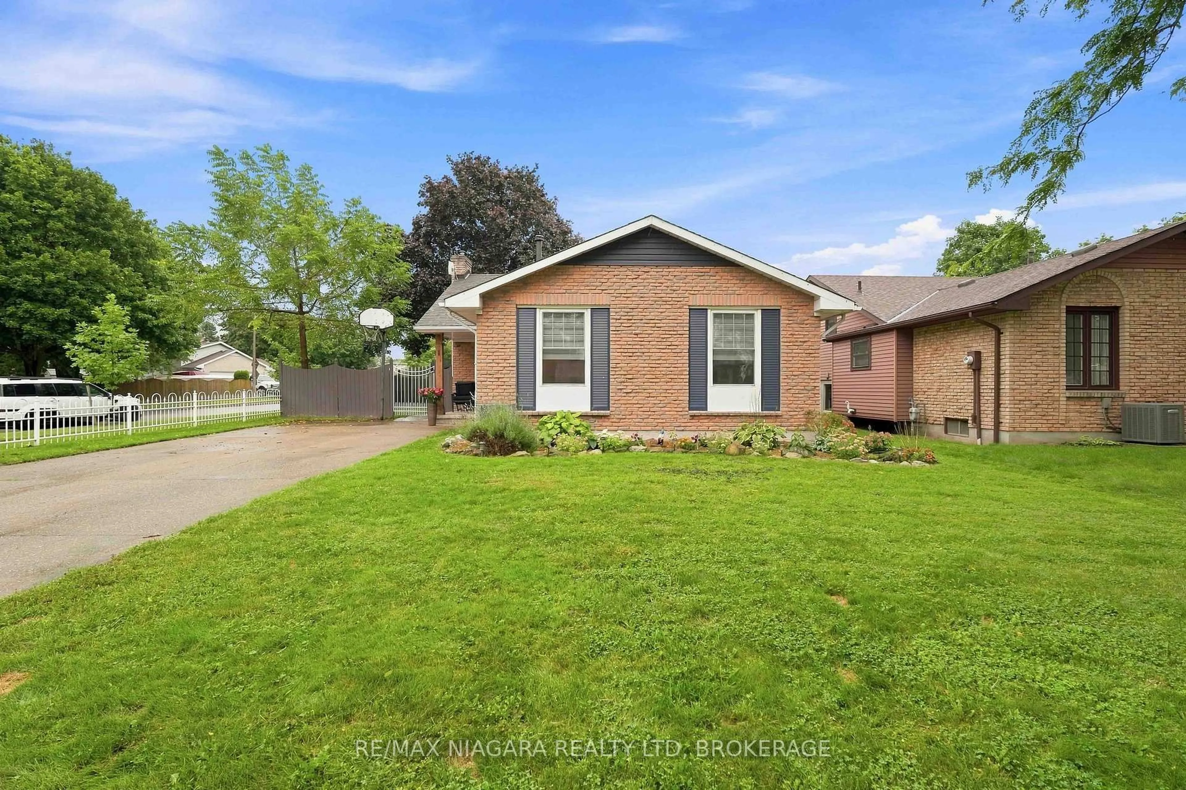 Home with brick exterior material, street for 1 Belair Dr, St. Catharines Ontario L2N 6X7
